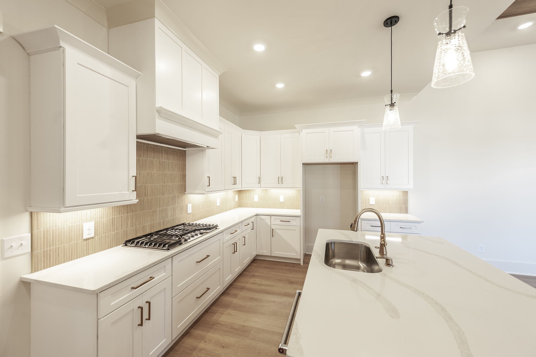 339 Raintree Drive Hendersonville, TN 37075 - Photo 43 of 53 a kitchen with a sink stove and white cabinets