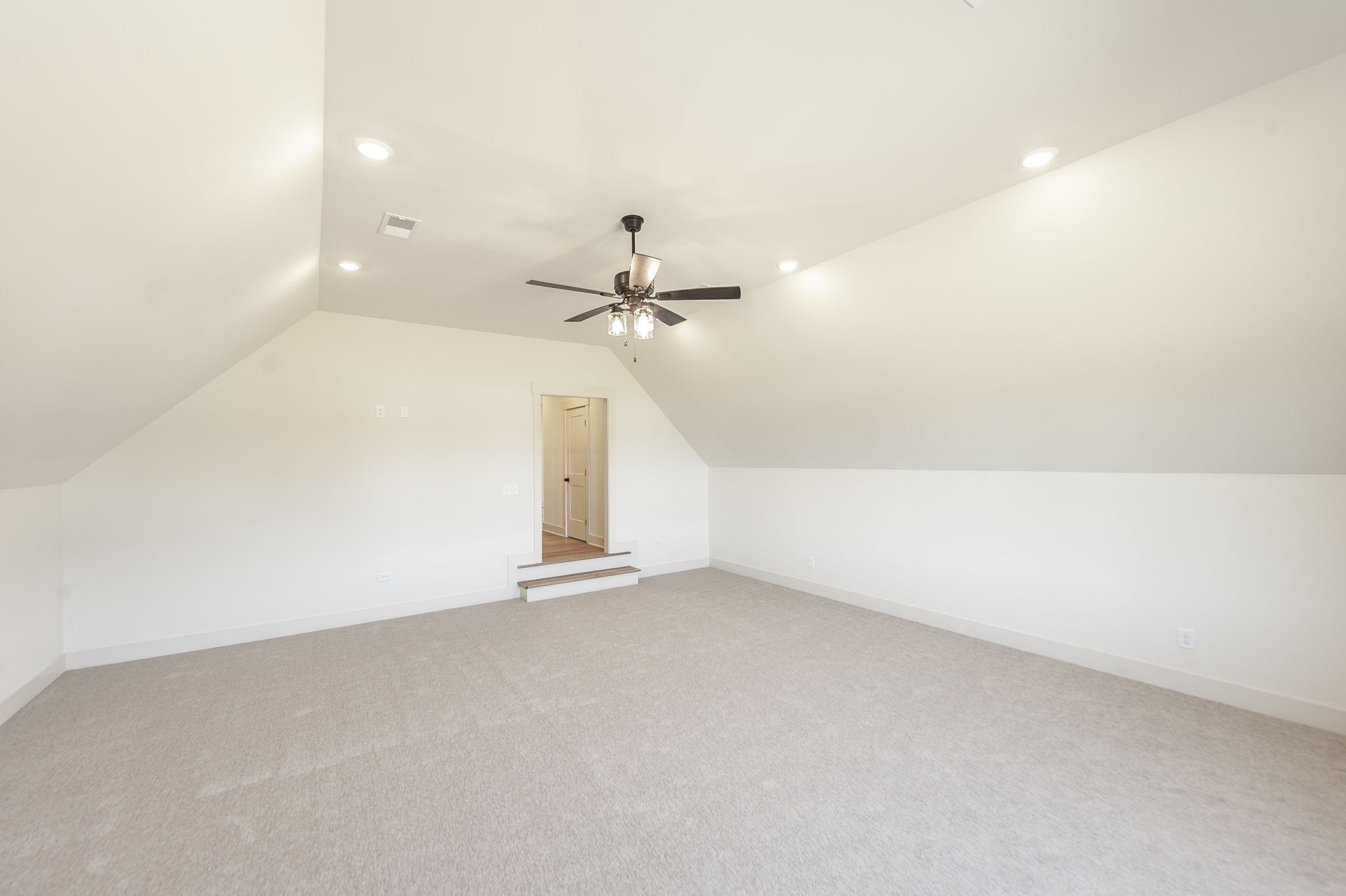 339 Raintree Drive Hendersonville, TN 37075 - Photo 48 of 53 an empty room with a ceiling fan and carpet