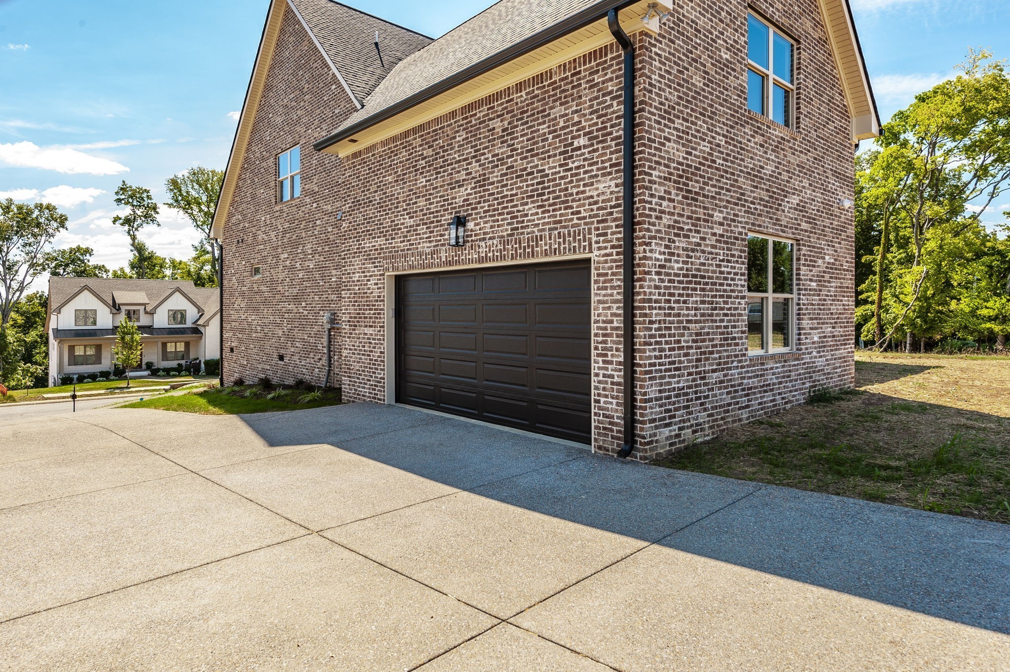 339 Raintree Drive Hendersonville, TN 37075 - Photo 5 of 53 a view of a brick house with a street