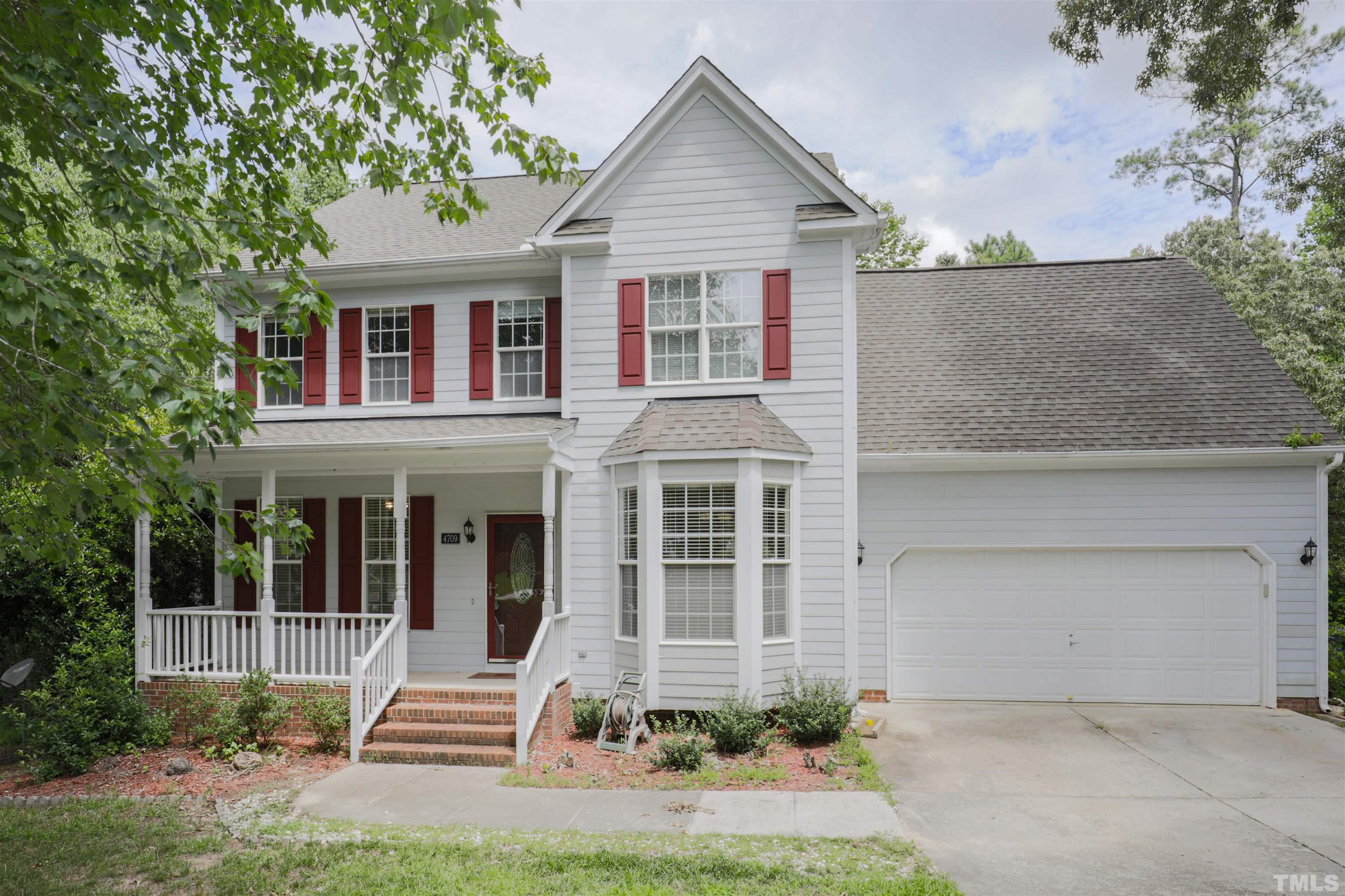 4709 Treadstone Court Raleigh, NC 27616 - Photo 1 of 22 front view of a house with a yard