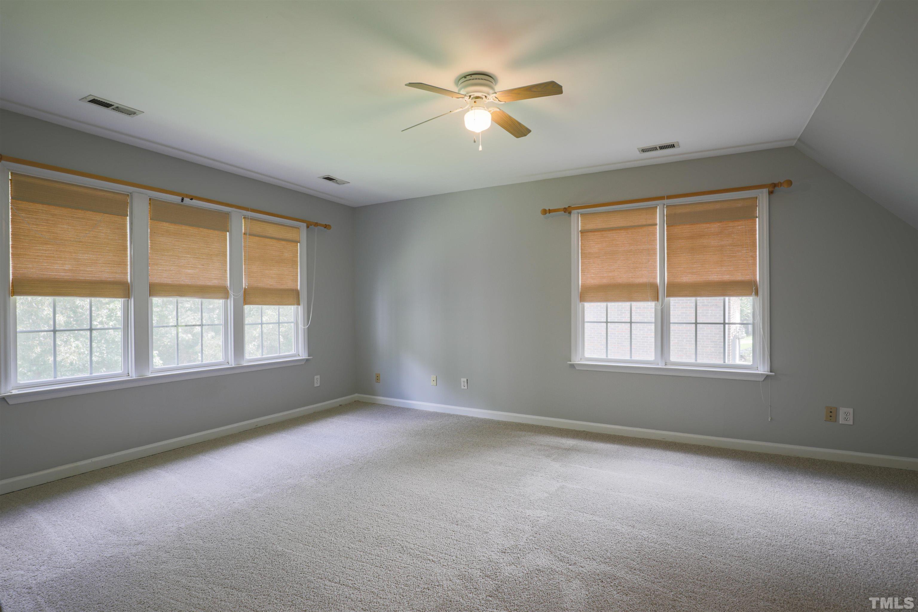 4709 Treadstone Court Raleigh, NC 27616 - Photo 19 of 22 a view of an empty room with a window