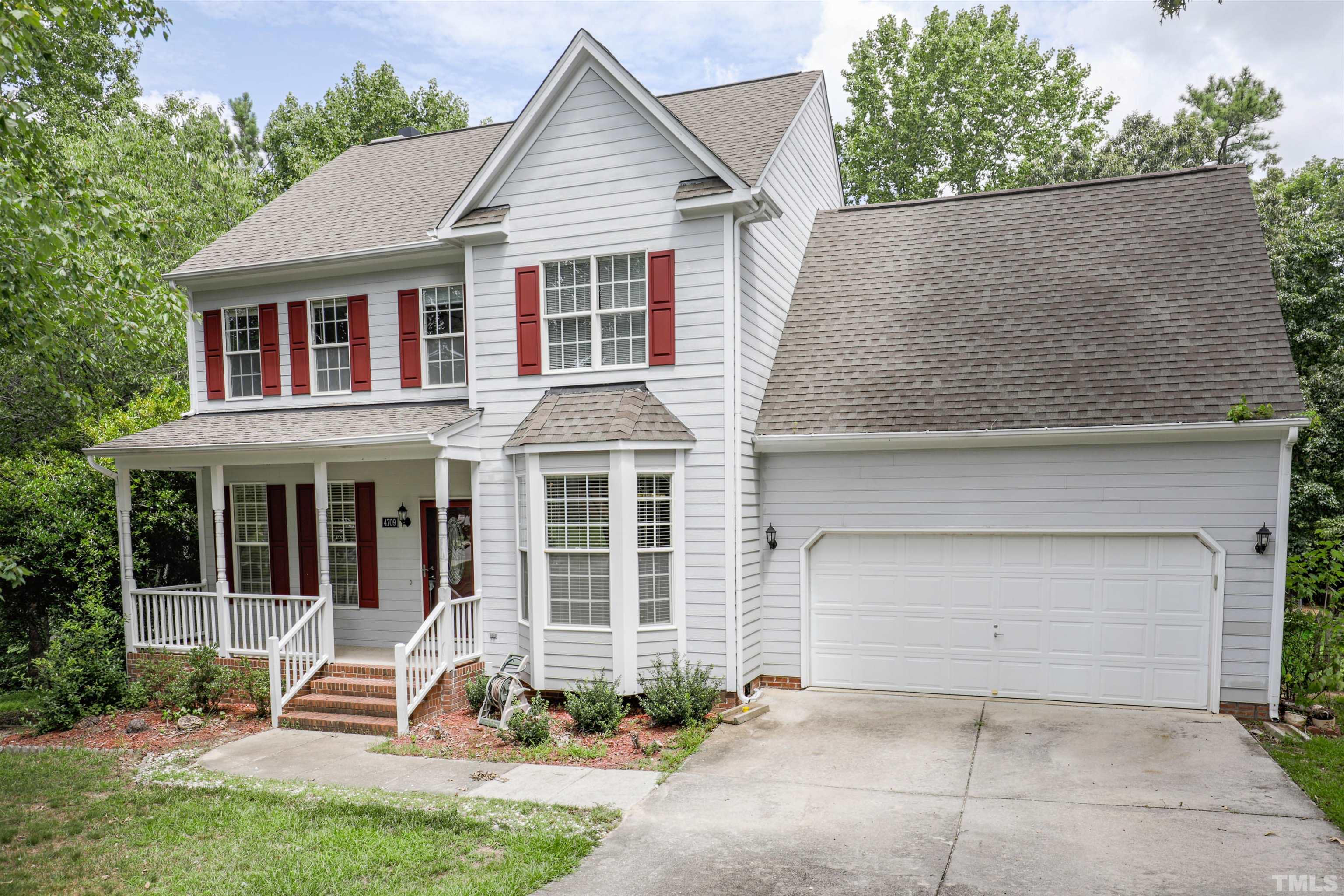 4709 Treadstone Court Raleigh, NC 27616 - Photo 8 of 22 front view of a house with a yard