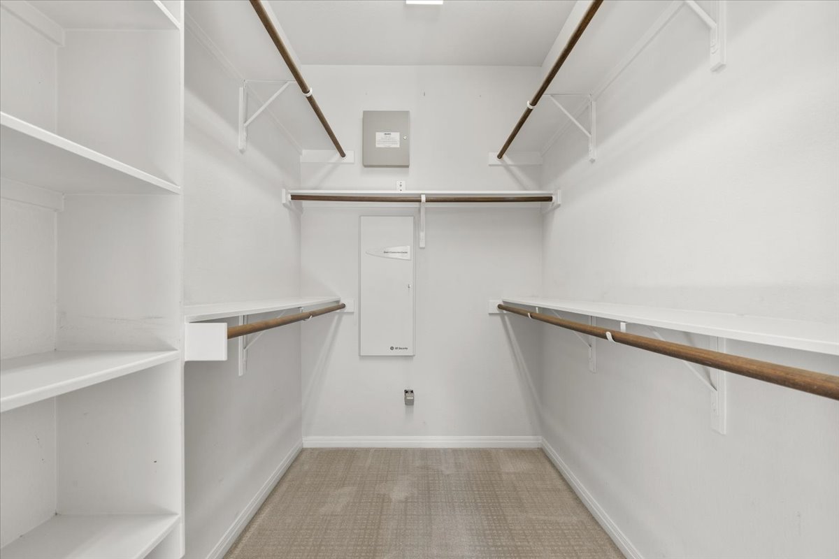 111 Whitley Drive Austin, TX 78738 - Photo 20 of 38 Primary walk-in closet,