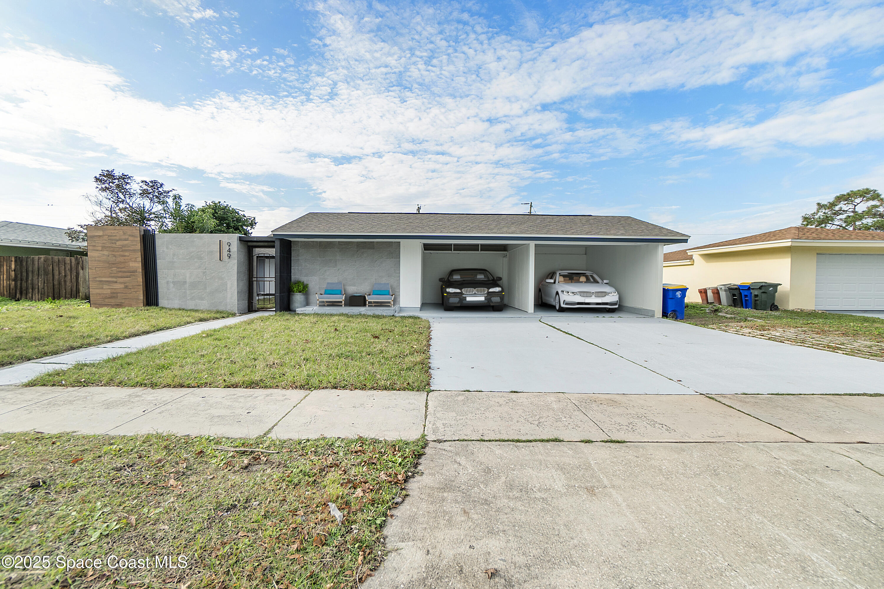 949 Levitt Parkway Rockledge, FL 32955 - Photo 18 of 52 a front view of a house with a yard and garage