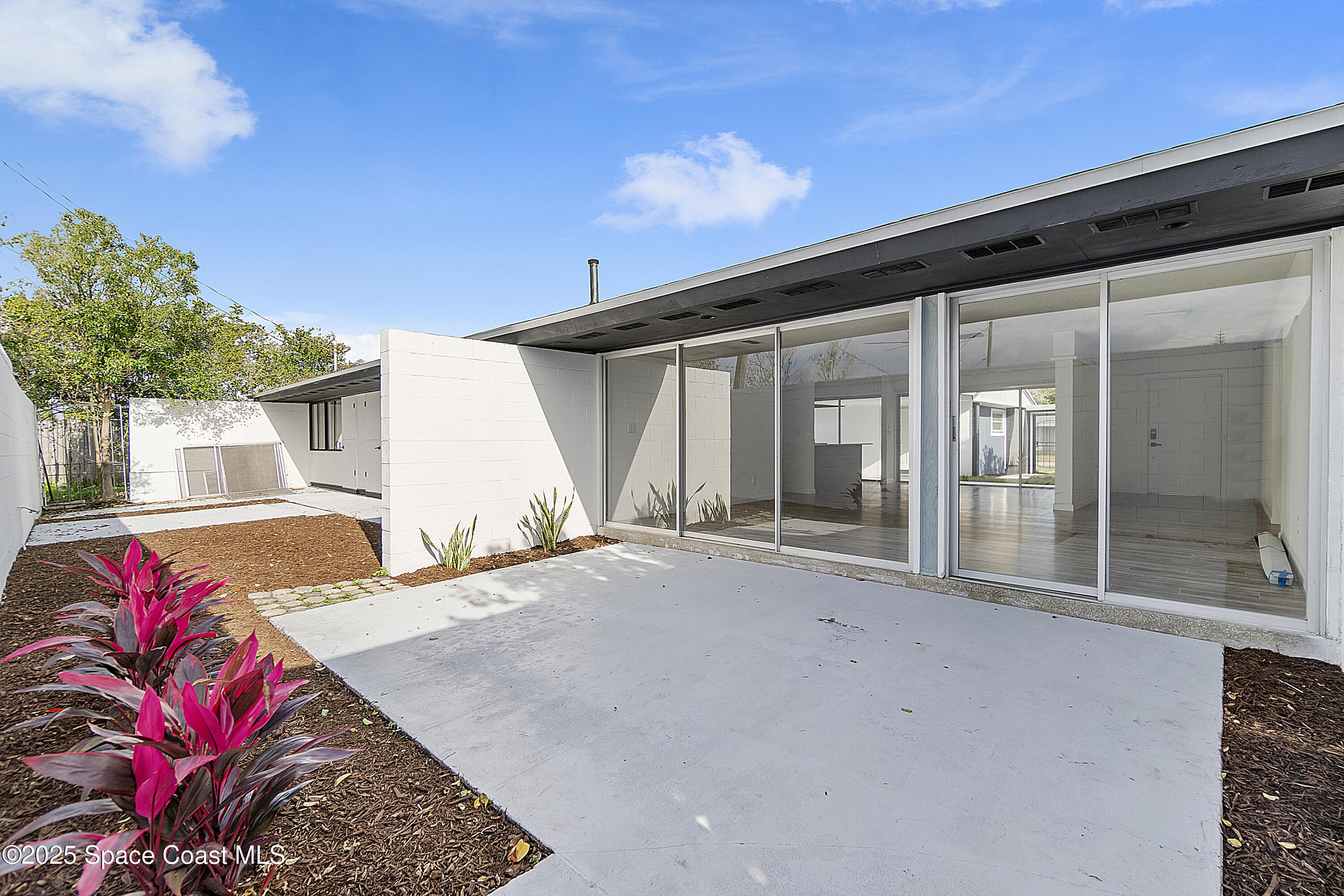 949 Levitt Parkway Rockledge, FL 32955 - Photo 24 of 52 a front view of a house with a garage