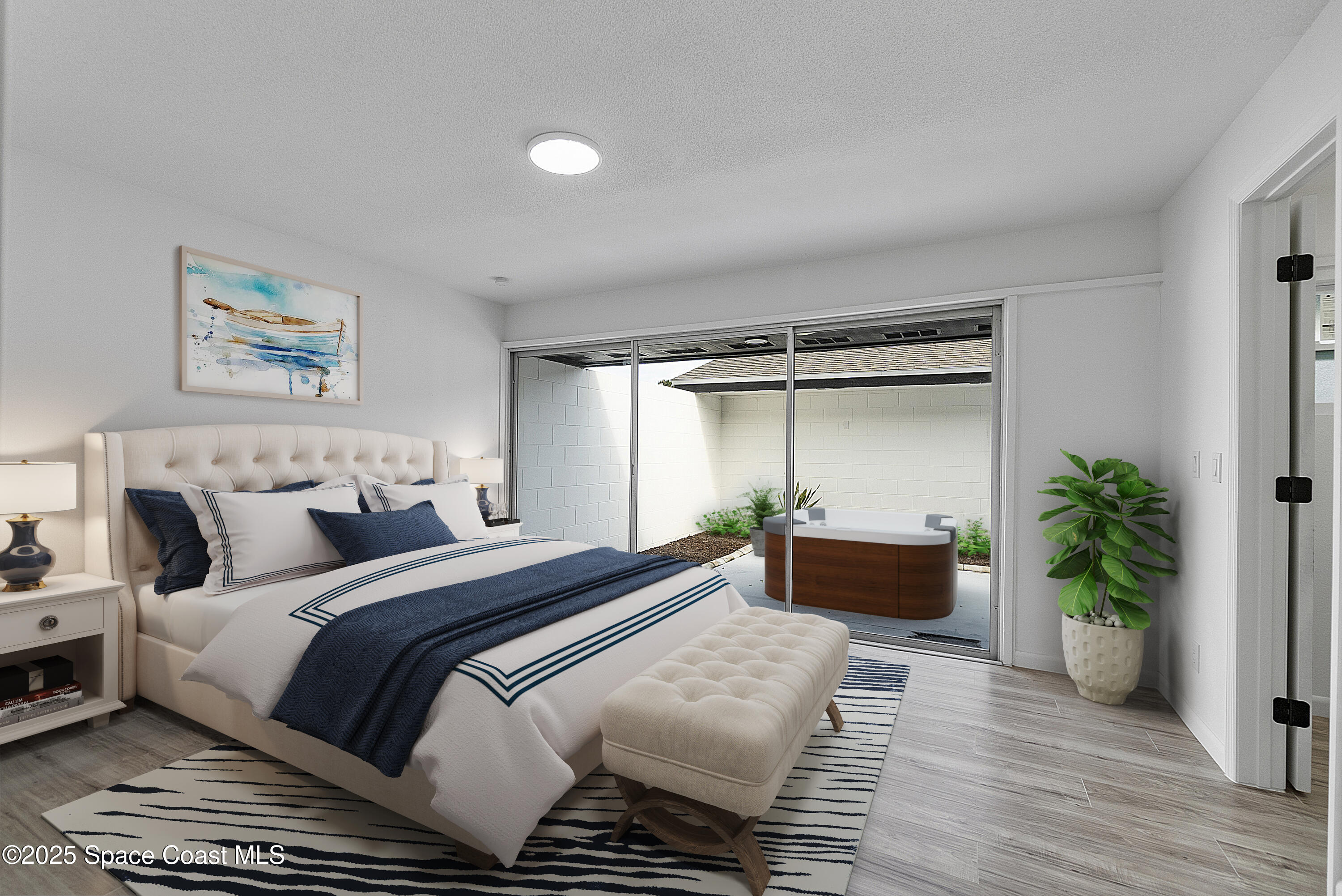 949 Levitt Parkway Rockledge, FL 32955 - Photo 41 of 52 a bedroom with bed and a potted plant