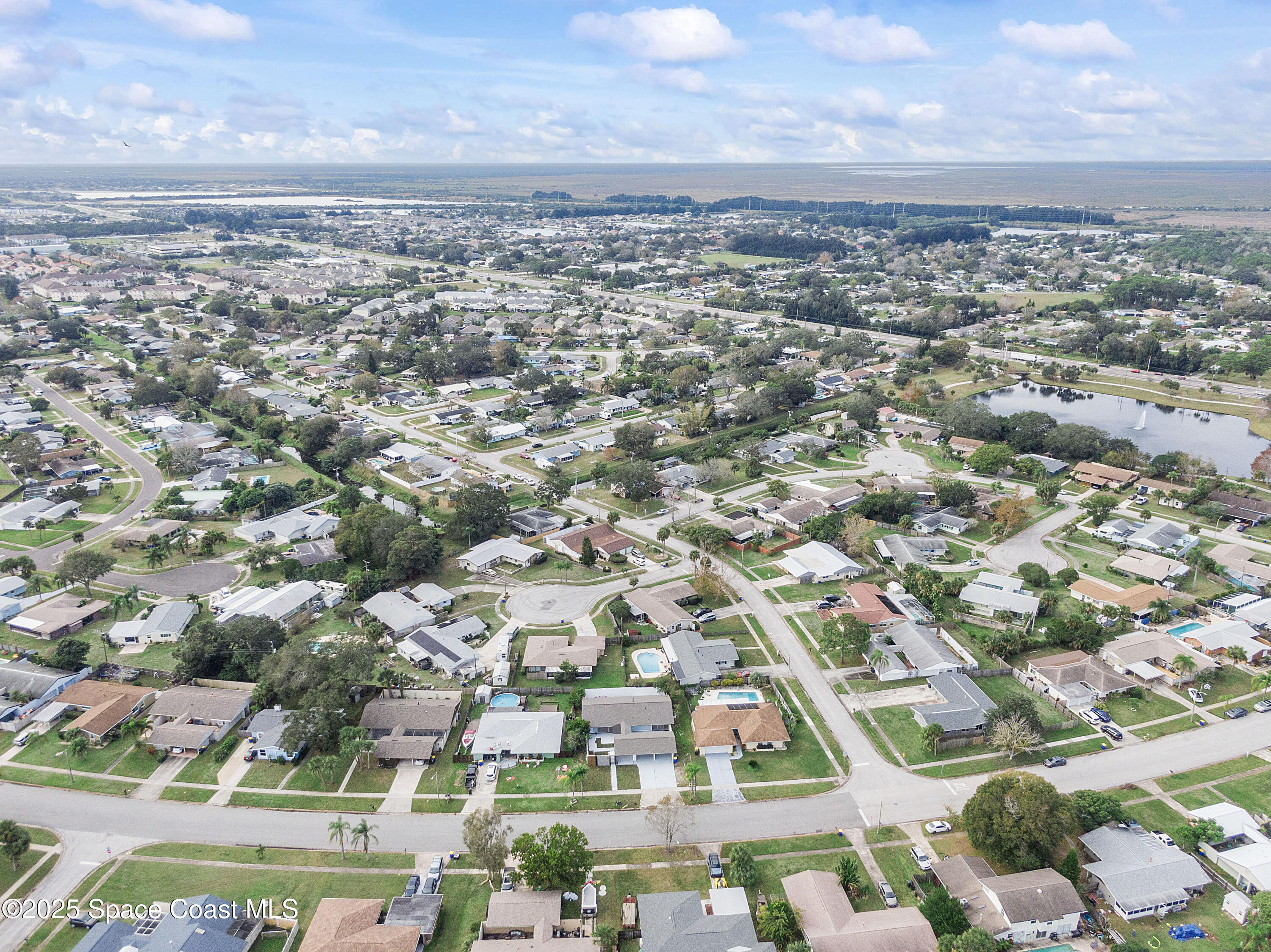 949 Levitt Parkway Rockledge, FL 32955 - Photo 5 of 52 an aerial view of multiple house