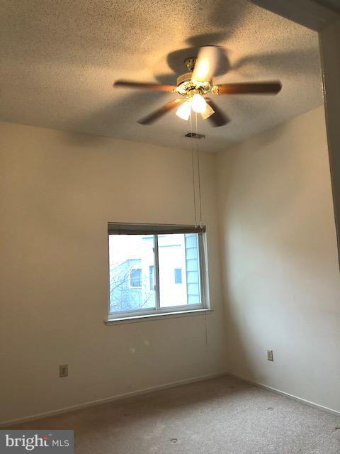 1961 Villaridge Drive, Unit B Reston, VA 20191 - Photo 12 of 21 Master bedroom and ceiling fan