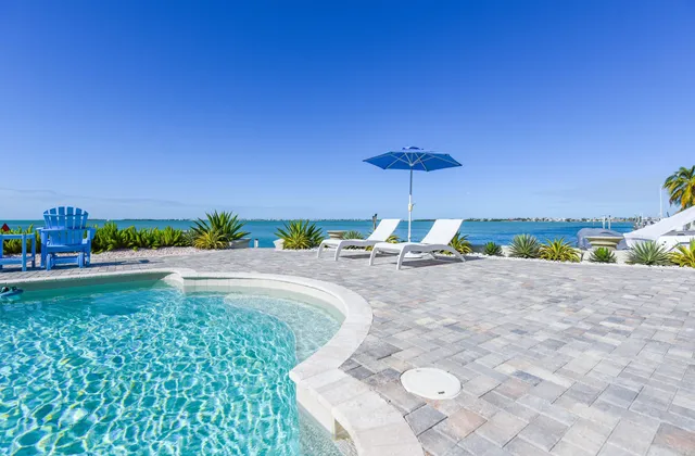 a view of a lake with a building in the background