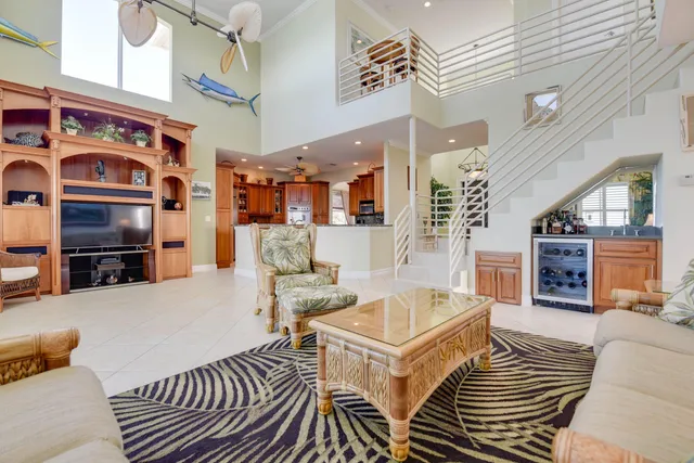 a view of a livingroom with furniture window and wooden floor