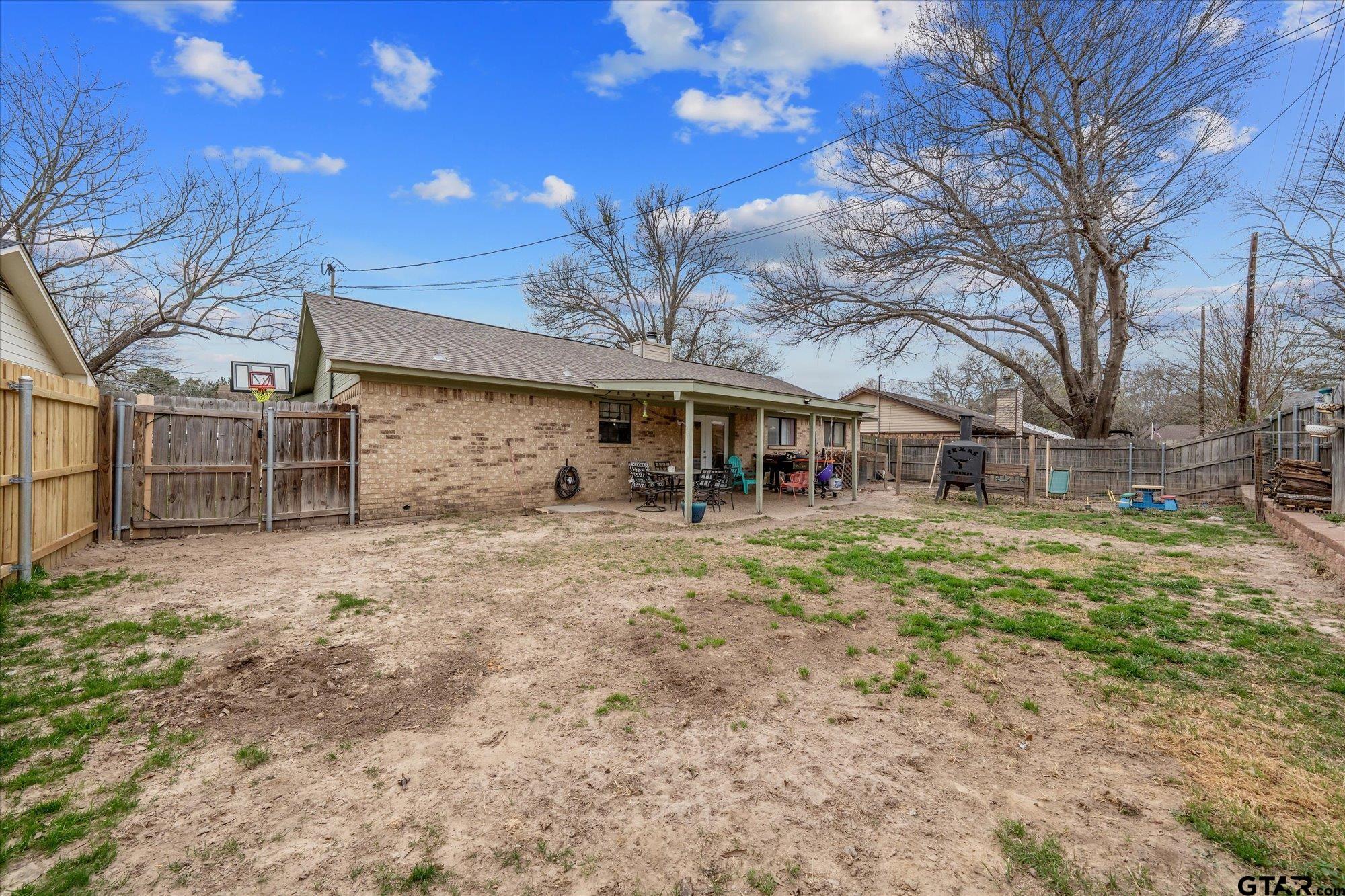 1105 Meadow Drive Athens, TX 75751 - Photo 20 of 23 a front view of a house with a garden