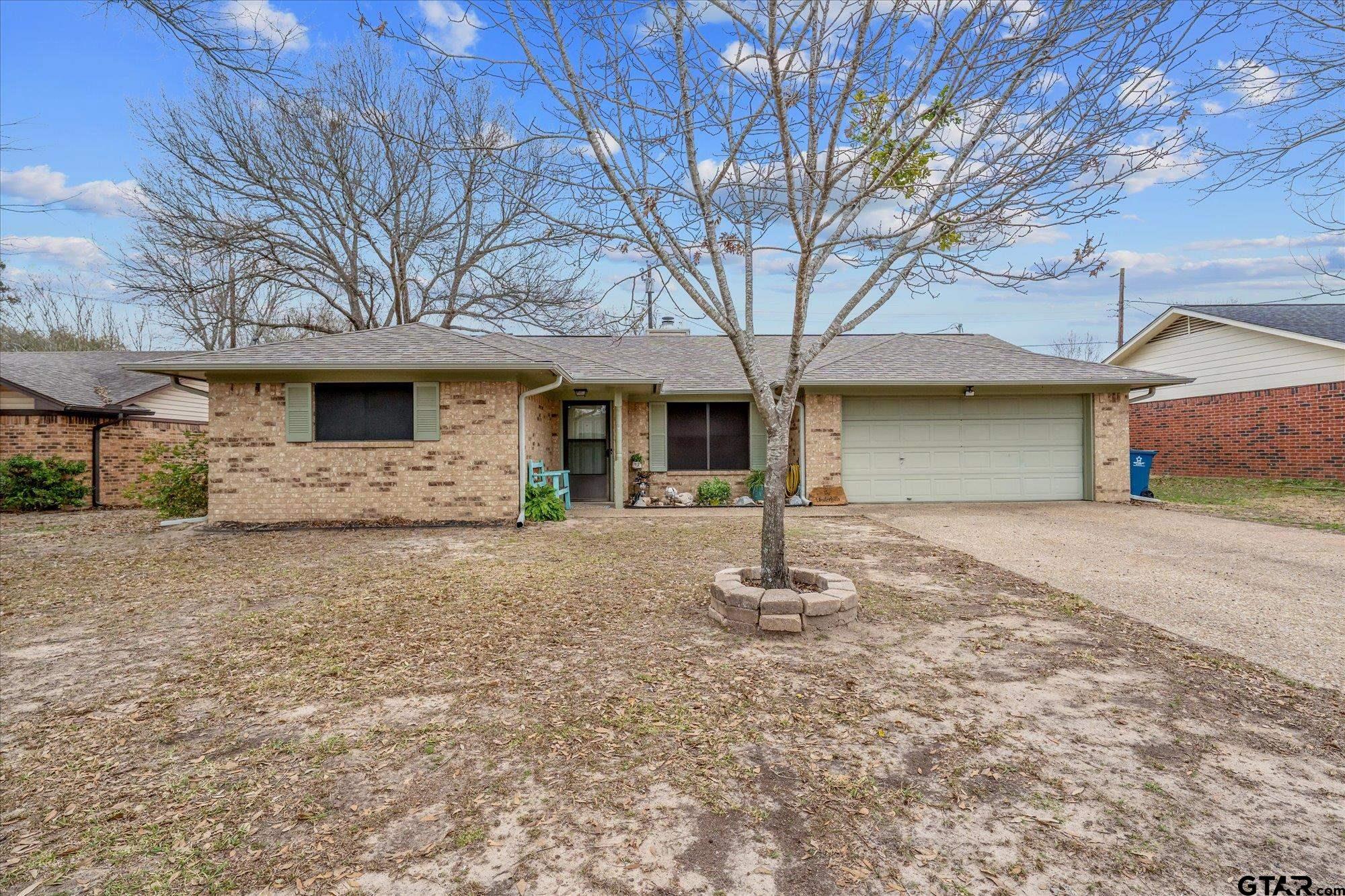 1105 Meadow Drive Athens, TX 75751 - Photo 23 of 23 a front view of a house with a tree