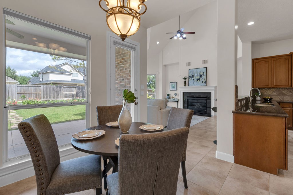 7306 Starflower Katy, TX 77494 - Photo 19 of 50 a view of a dining room with furniture window and outside view
