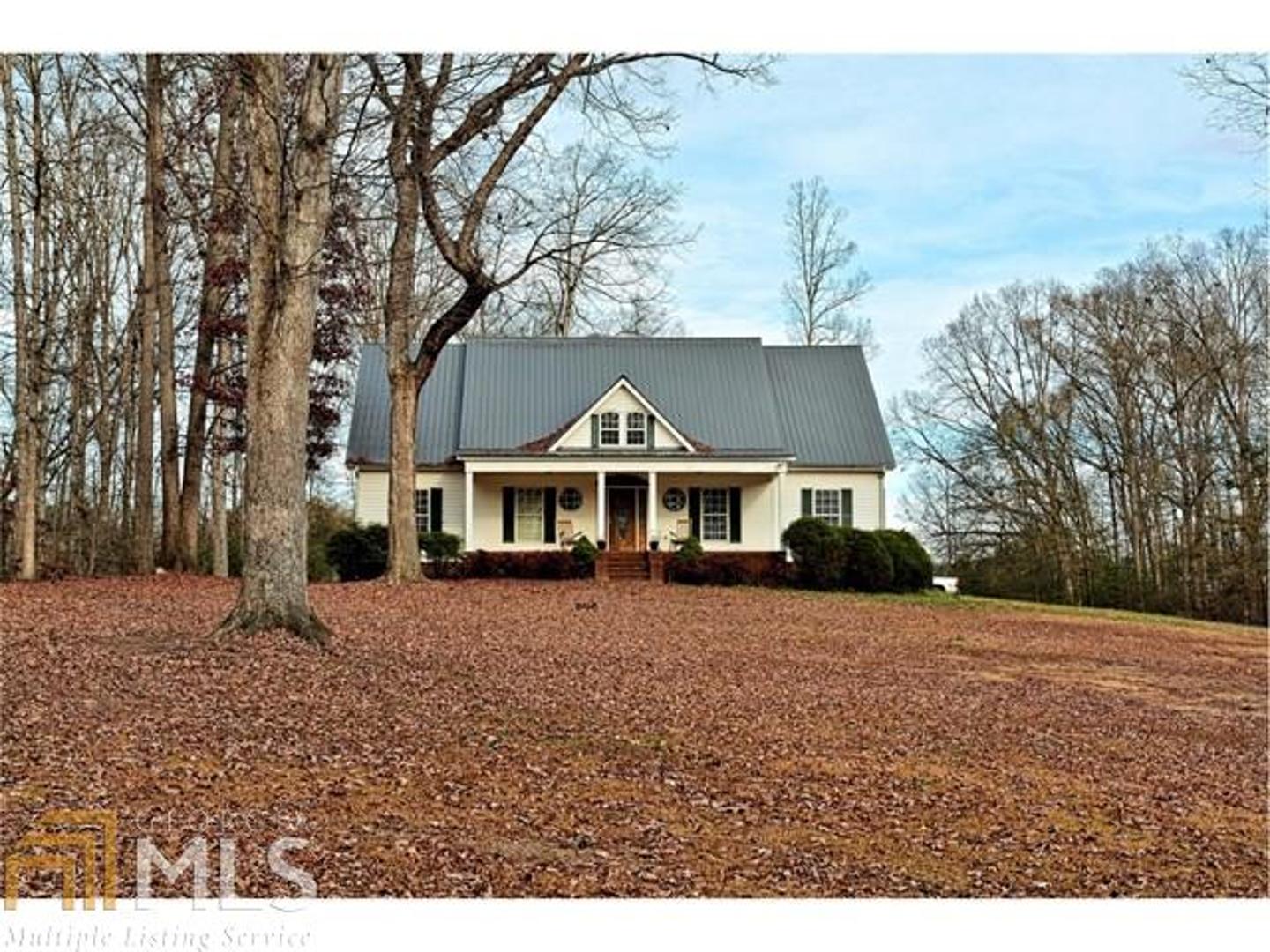 560 Rocky Ford Road Carnesville, GA 30521 - Photo 1 of 1 a view of a house with a yard