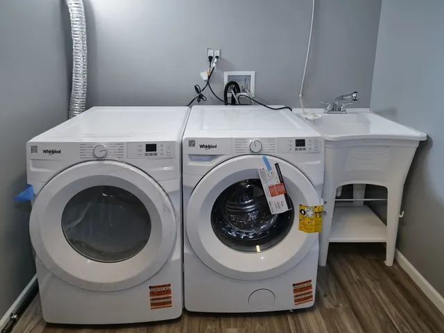 a utility room with dryer and washer