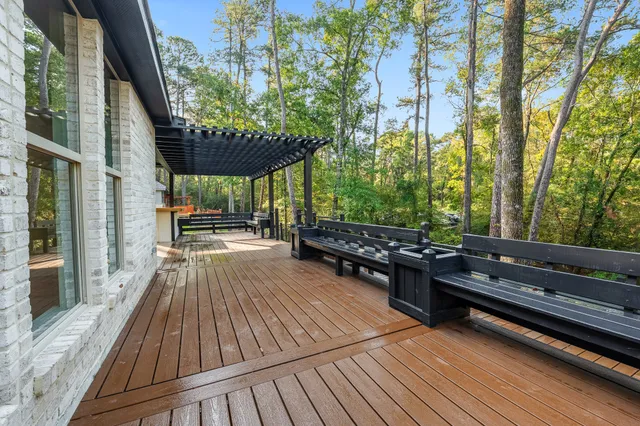 a view of outdoor space with deck and hardwood