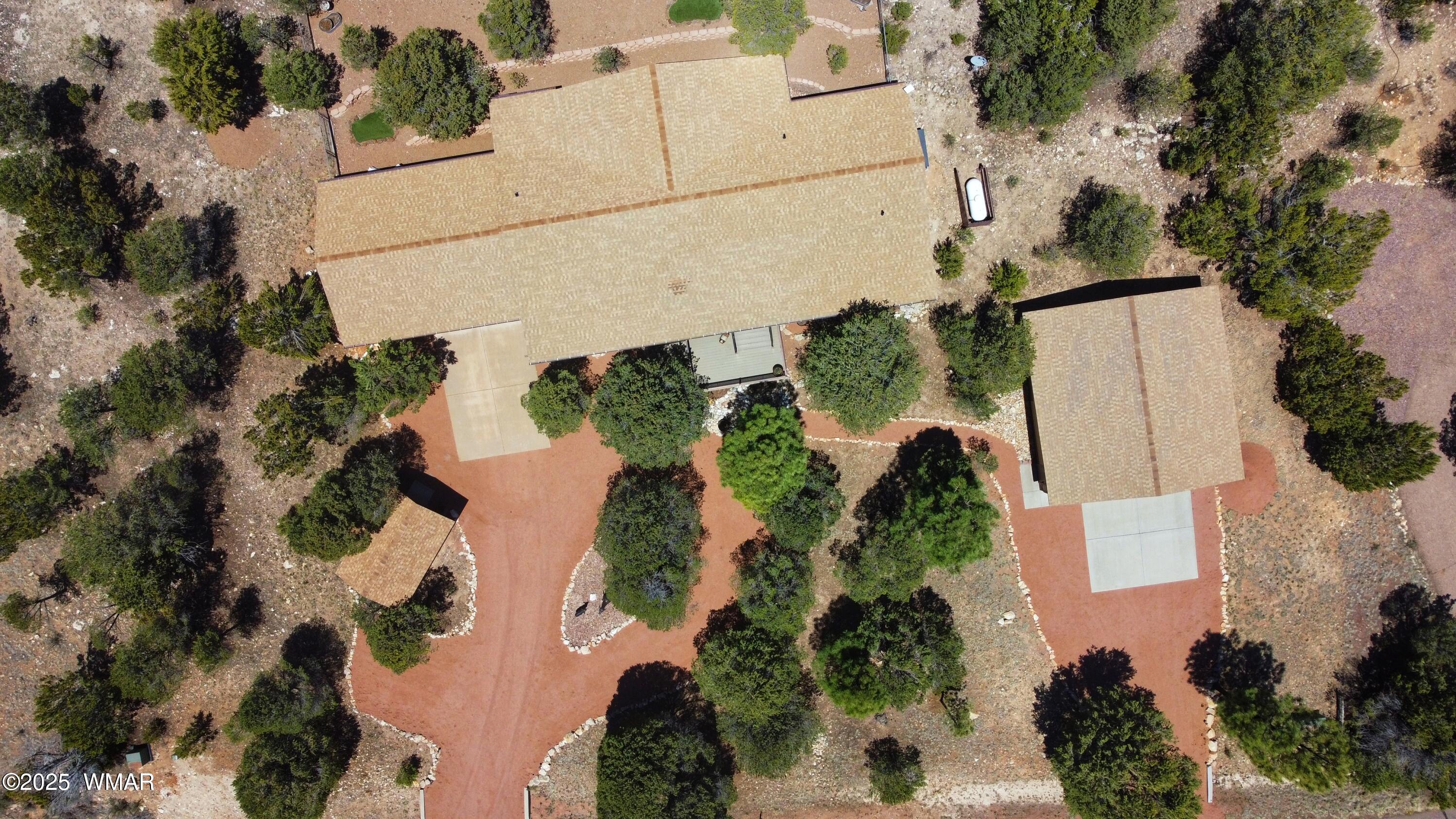 2938 Lodgepole Road Overgaard, AZ 85933 - Photo 42 of 43 an aerial view of a house with a yard