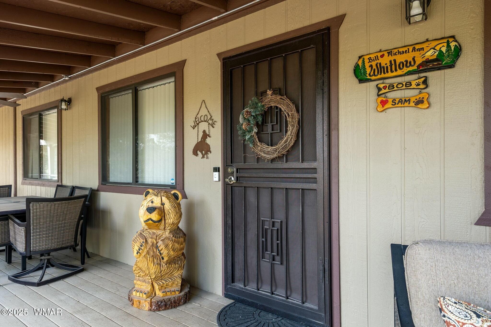 2938 Lodgepole Road Overgaard, AZ 85933 - Photo 7 of 43 a bed room with a bed and a window