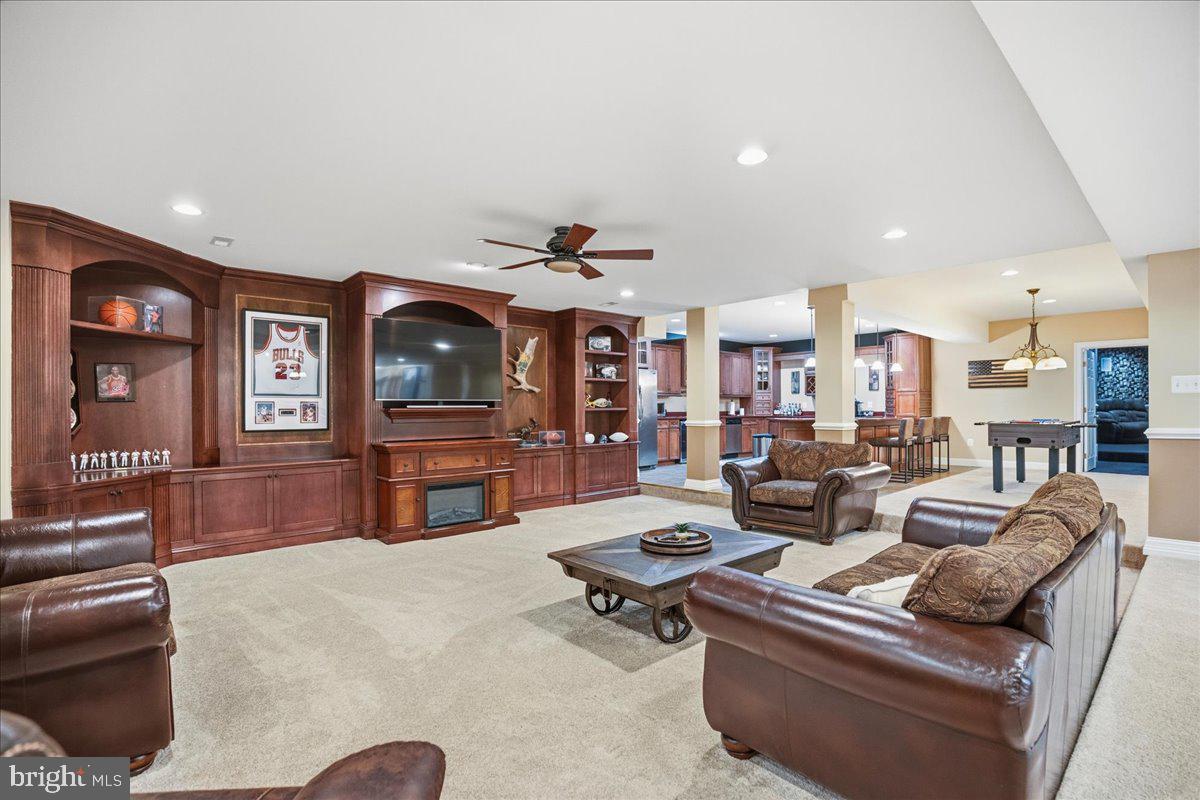 4100 Hidden Creek Road Port Republic, MD 20676 - Photo 83 of 99 This lower level is the action! Massive built-ins