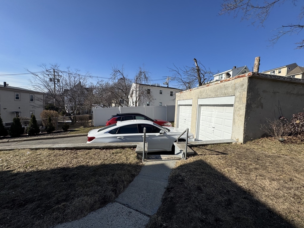 28 Quirk Street, Unit 28 Watertown, MA 02472 - Photo 22 of 23 a house view with a backyard space