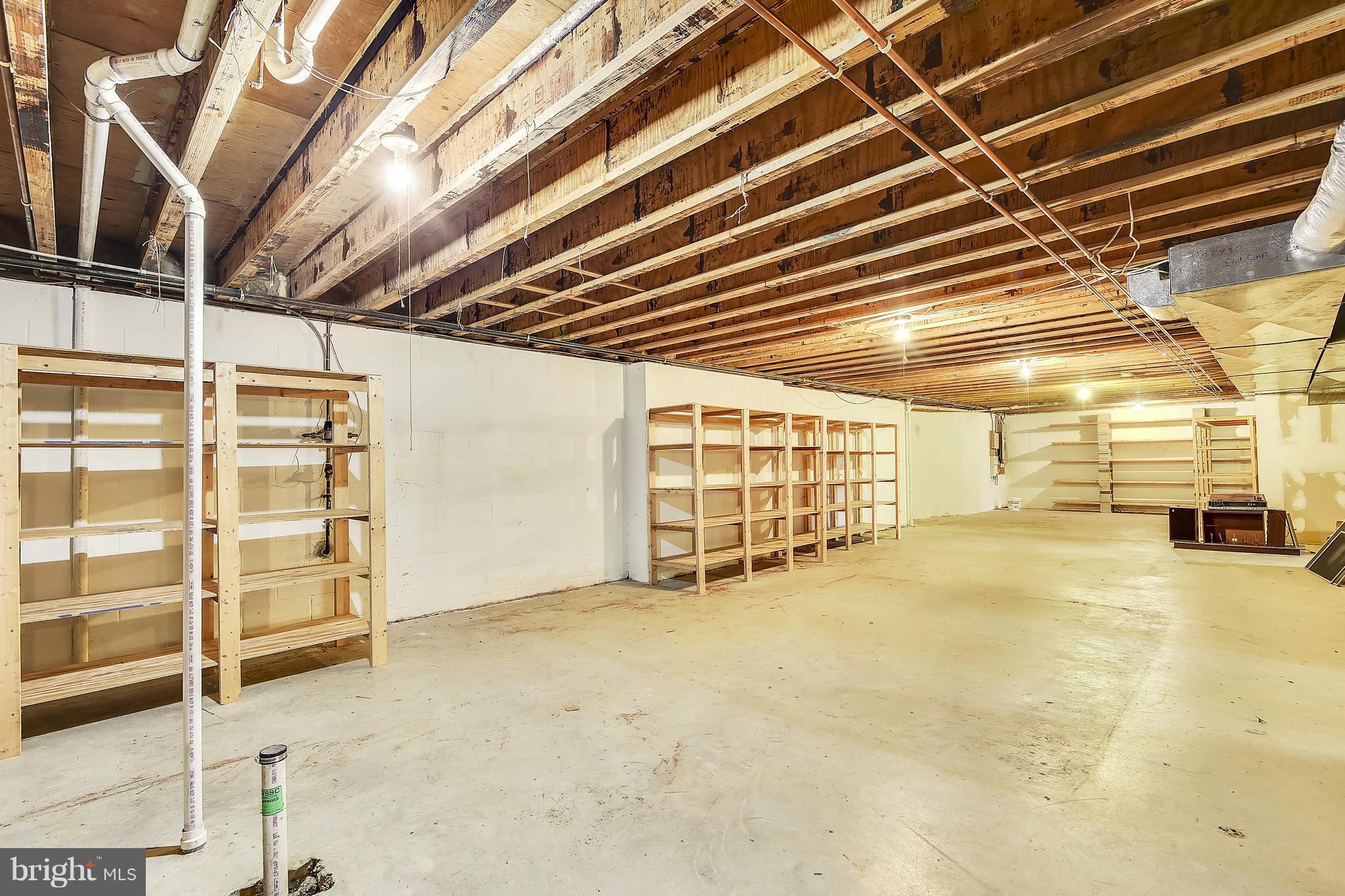 10226 Parkman Road Silver Spring, MD 20903 - Photo 26 of 30 Huge unfinished basement with bath rough-in.