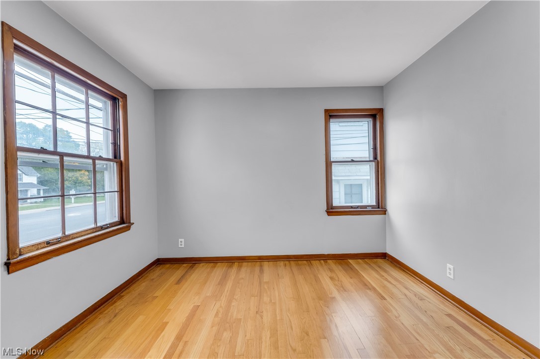 5384 Turney Road Cleveland, OH 44125 - Photo 7 of 27 Empty room with light hardwood / wood-style flooring