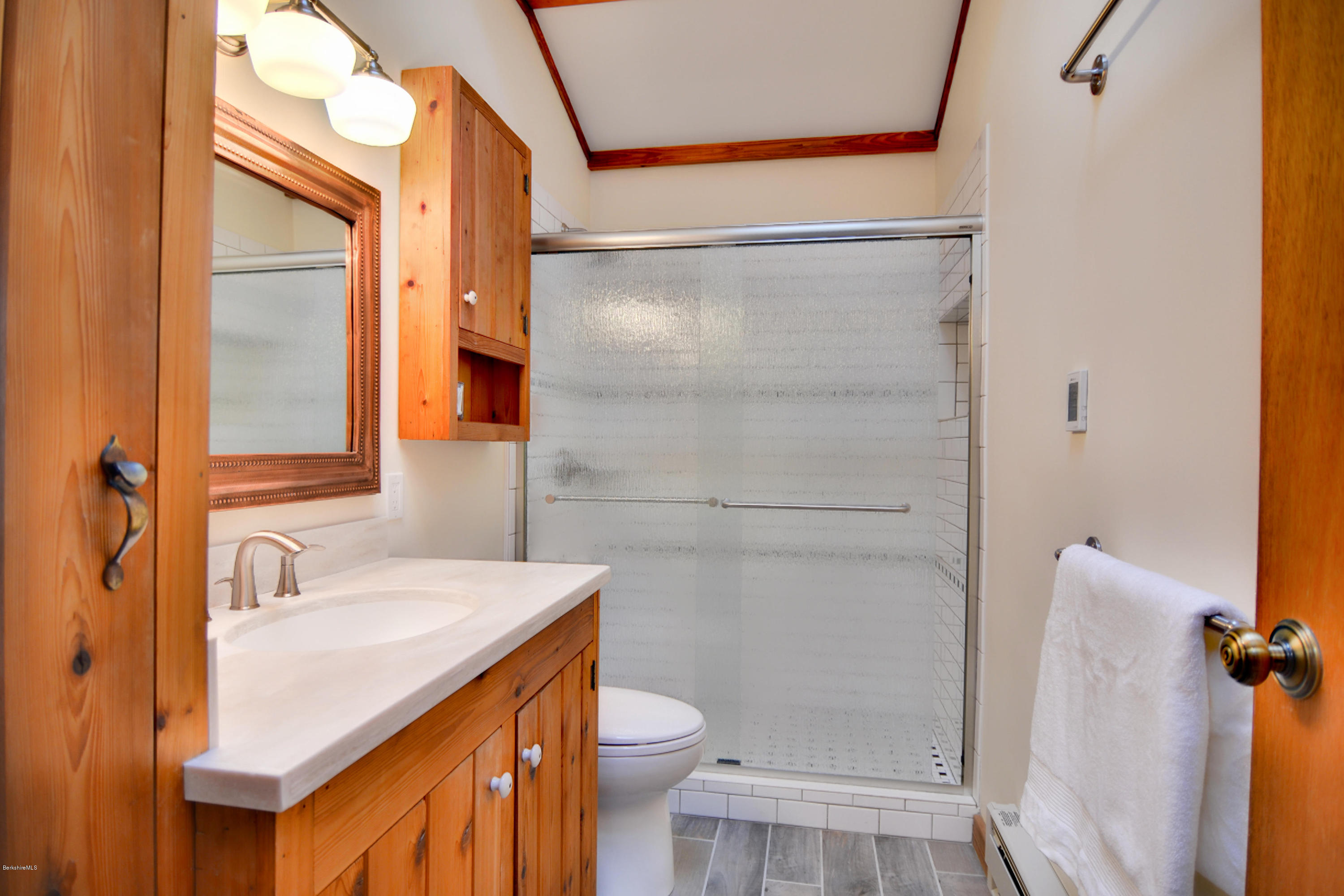 137 Whitman Road Hancock, MA 01267 - Photo 21 of 37 a bathroom with a sink a toilet and shower
