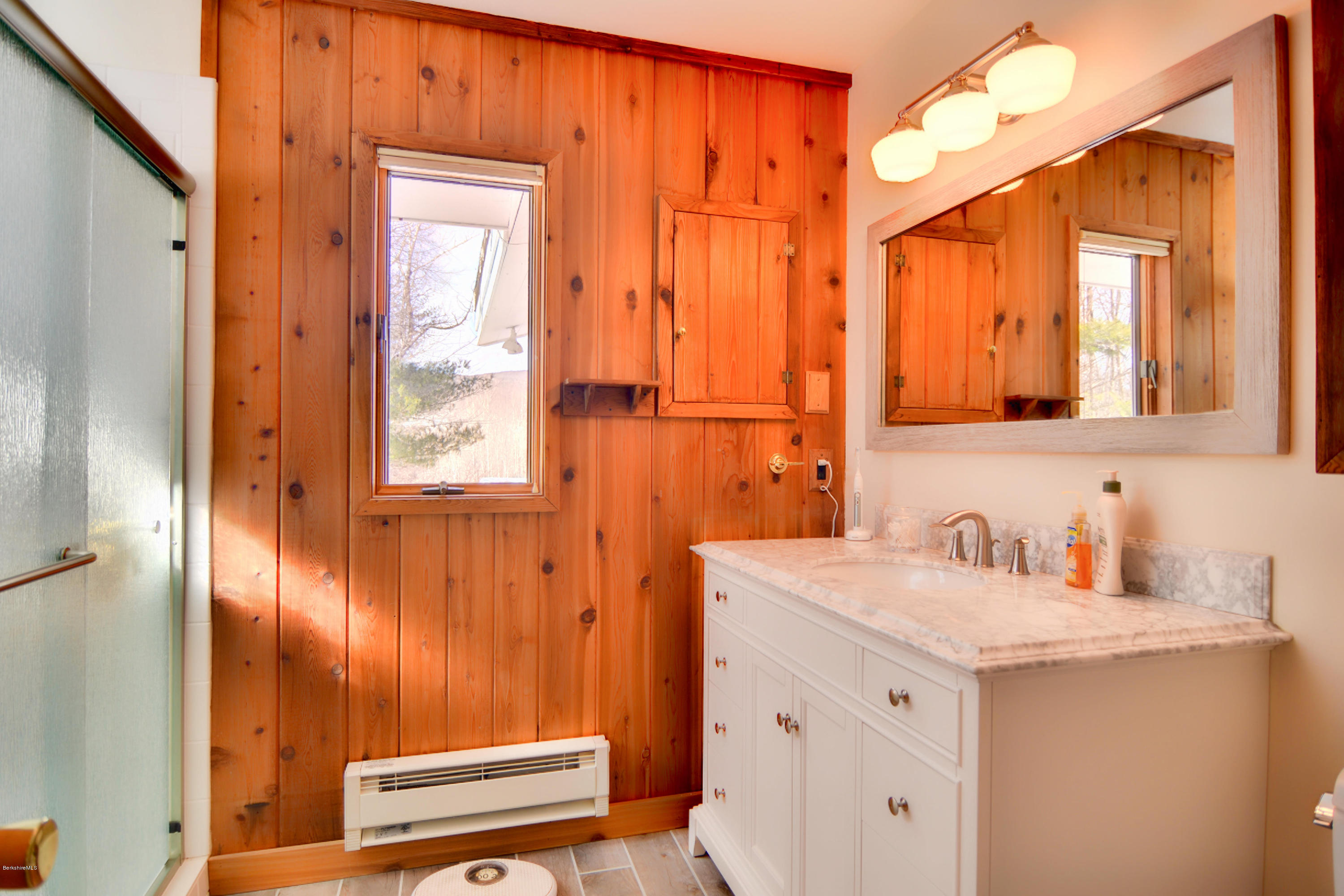 137 Whitman Road Hancock, MA 01267 - Photo 26 of 37 a bathroom with a sink a mirror and a shower