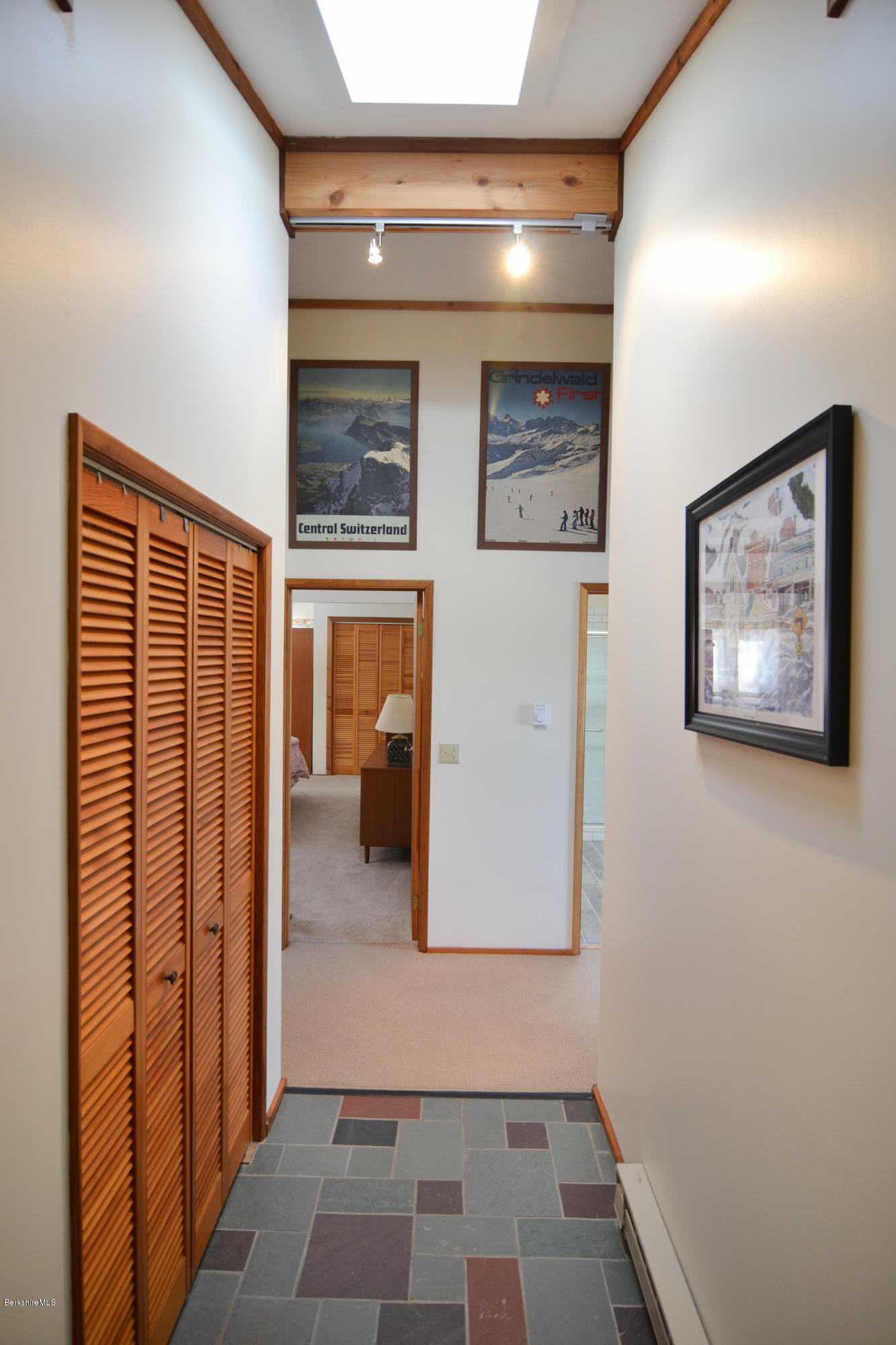 137 Whitman Road Hancock, MA 01267 - Photo 31 of 37 a view of a hallway with wooden floor and windows