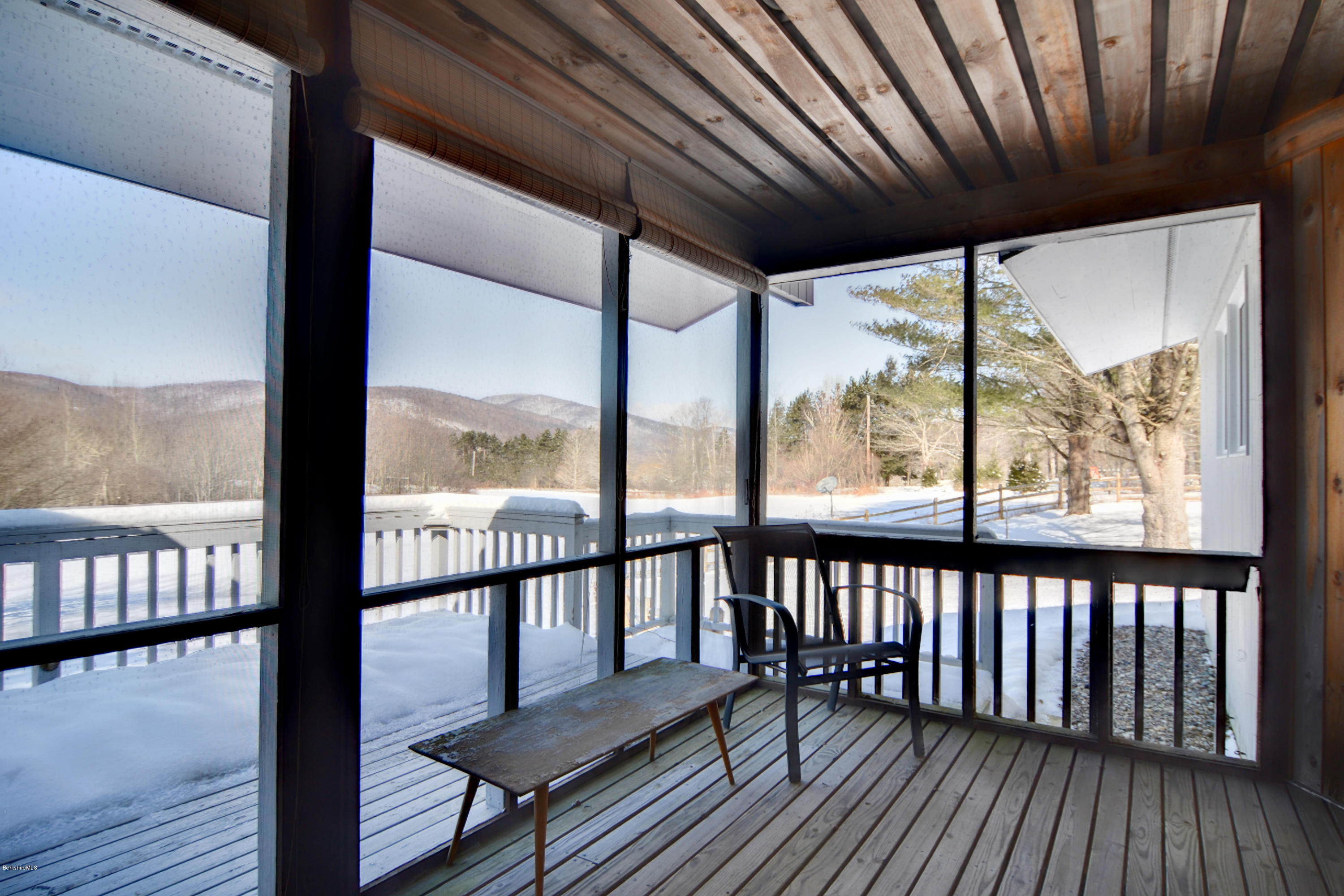 137 Whitman Road Hancock, MA 01267 - Photo 6 of 37 a view of a porch with wooden floor