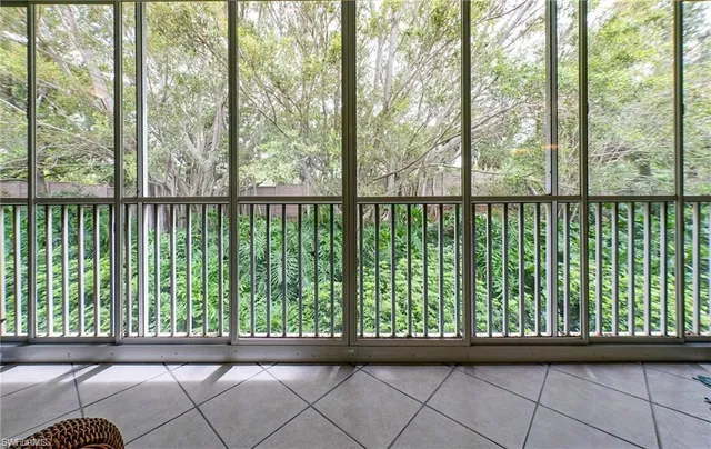 a view of a black and white trees