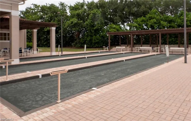 a view of a swimming pool with a porch