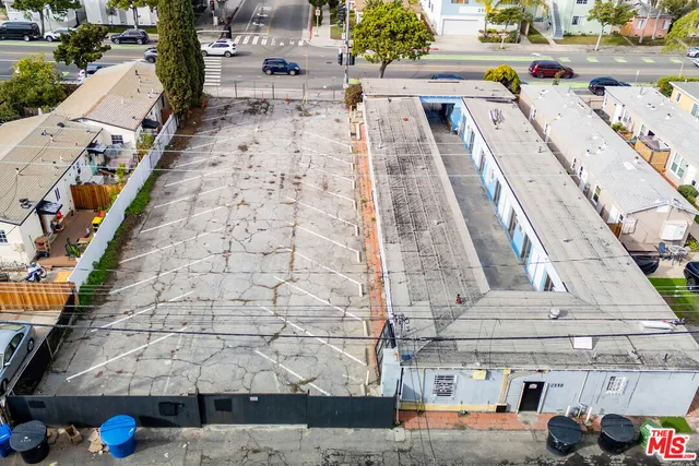a view of a terrace with wooden fence