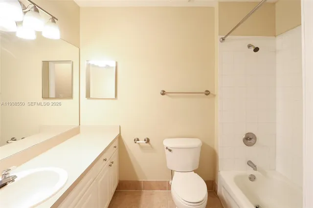 a view of a palm trees front of the house