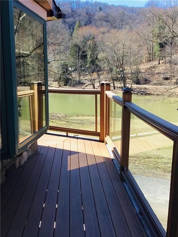 521 Stewartson Road Templeton, PA 16259 - Photo 19 of 25 a view of a balcony with wooden floor