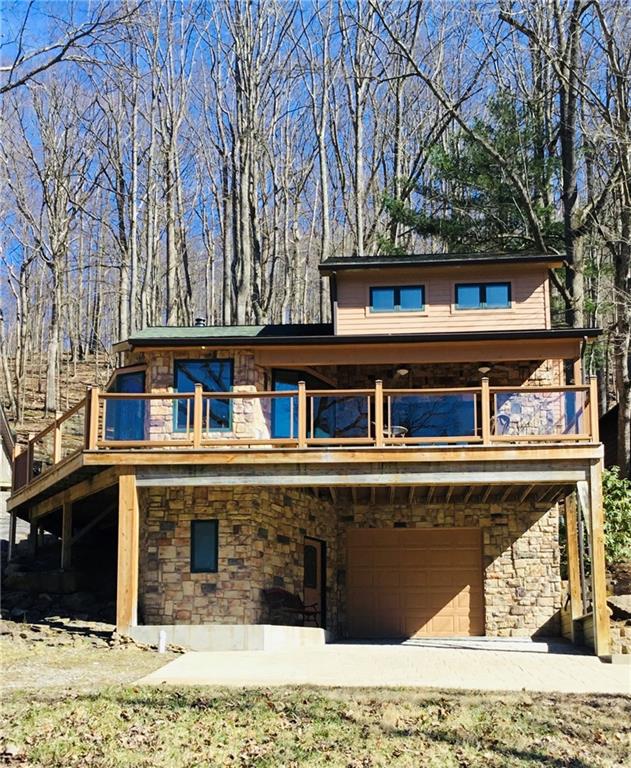 521 Stewartson Road Templeton, PA 16259 - Photo 2 of 25 a view of a building with large windows