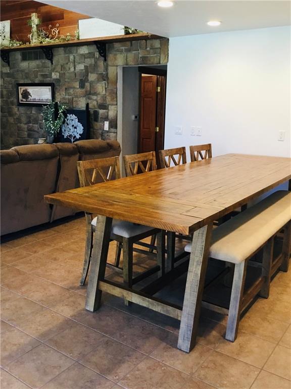 521 Stewartson Road Templeton, PA 16259 - Photo 10 of 25 a view of a chairs and table in a backyard