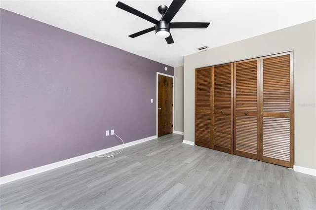a view of a house with a yard porch and sitting area
