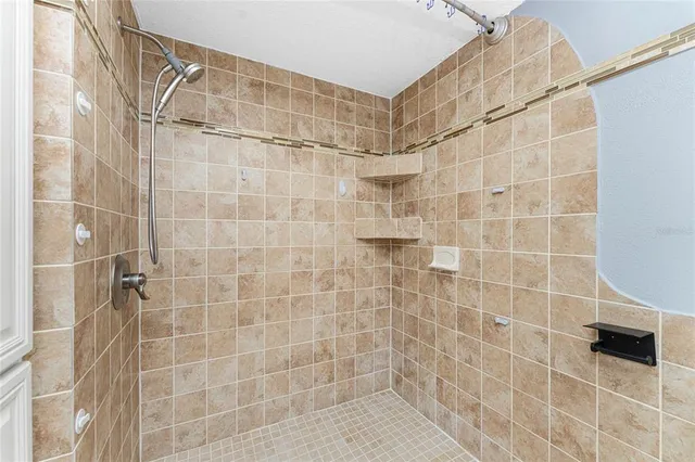 a view of a house with a backyard porch and sitting area