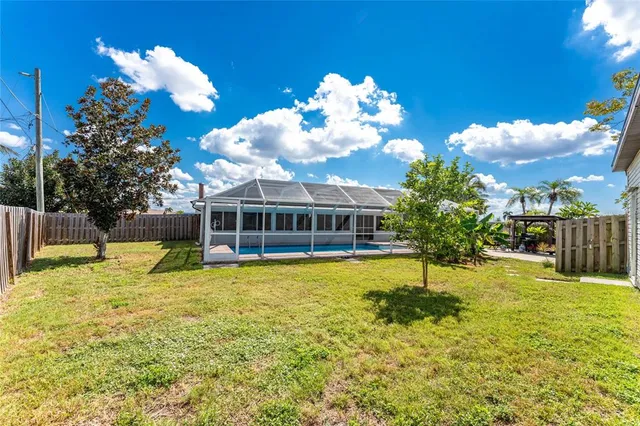 a view of a house with basketball court