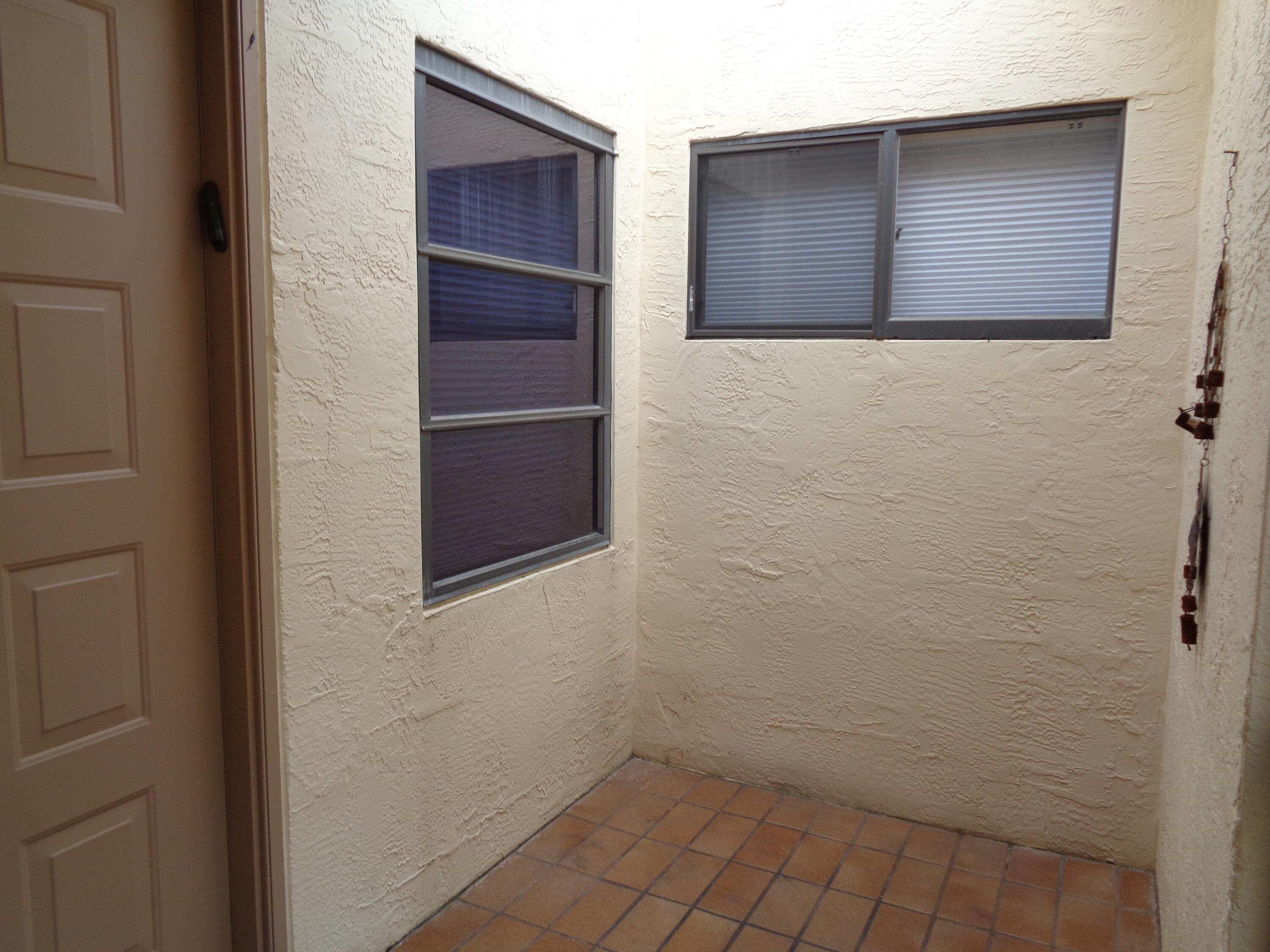 8193 Springview Terrace, Unit E Boca Raton, FL 33496 - Photo 5 of 47 Screened Atrium