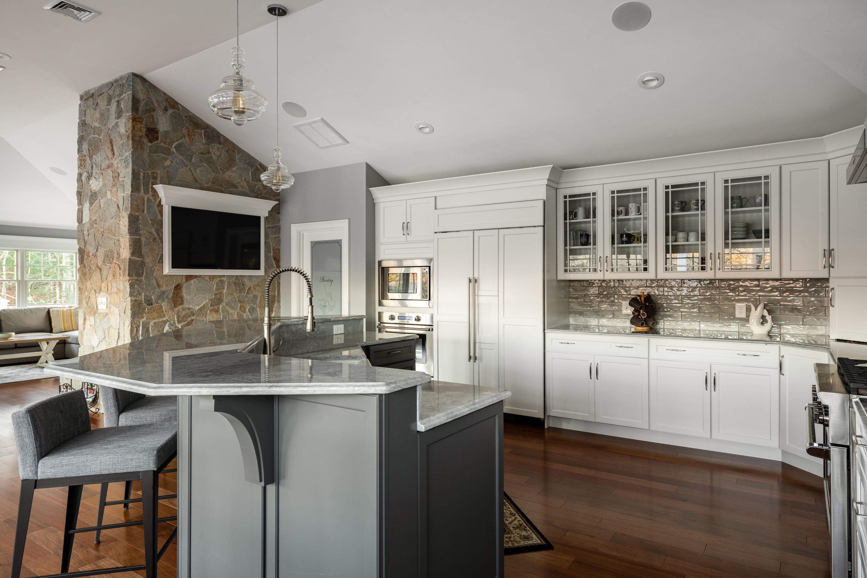 94 Starboard Lane Osterville, MA 02655 - Photo 15 of 47 a kitchen with kitchen island granite countertop a sink cabinets and stainless steel appliances