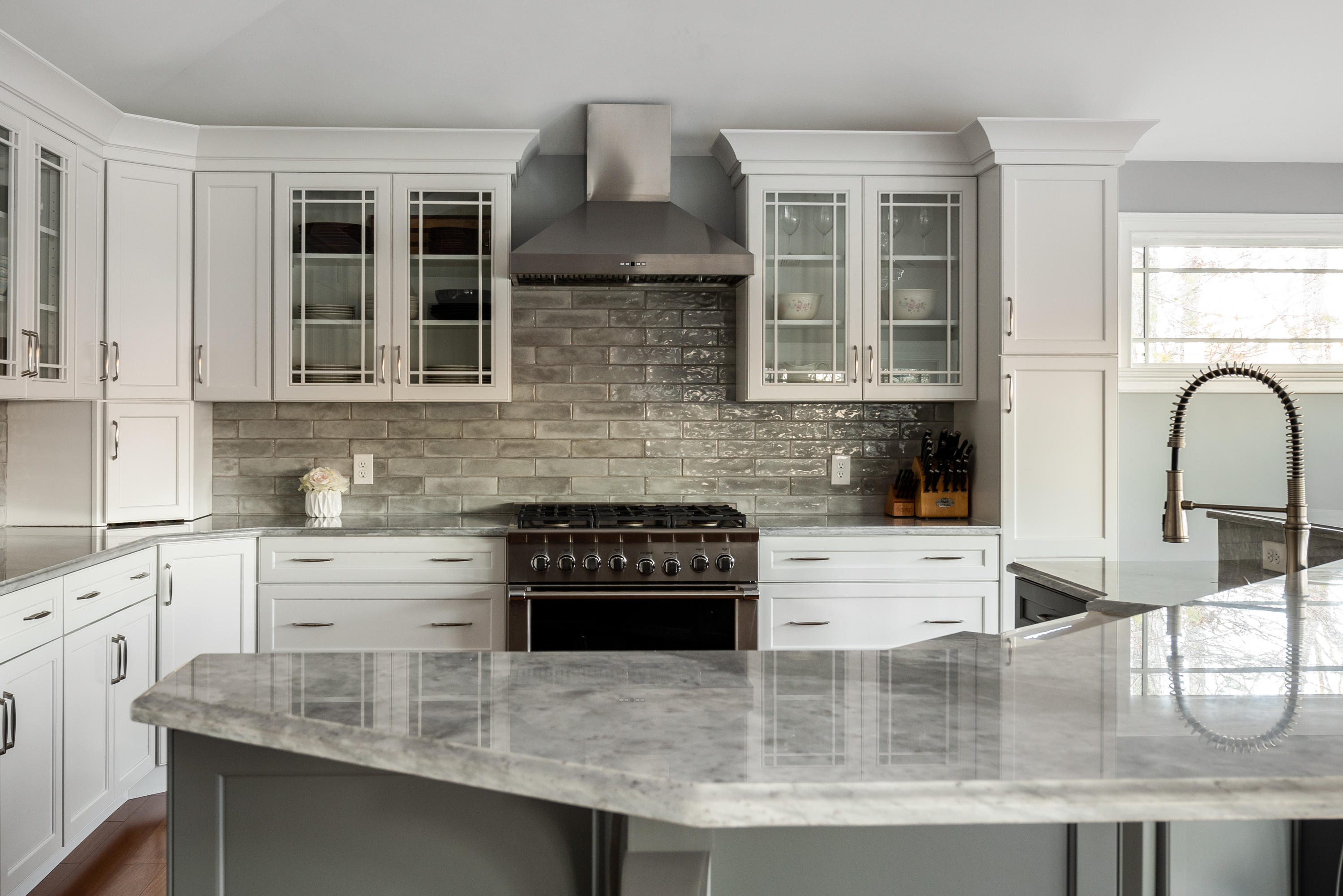 94 Starboard Lane Osterville, MA 02655 - Photo 17 of 47 a kitchen with granite countertop a stove a sink and a microwave