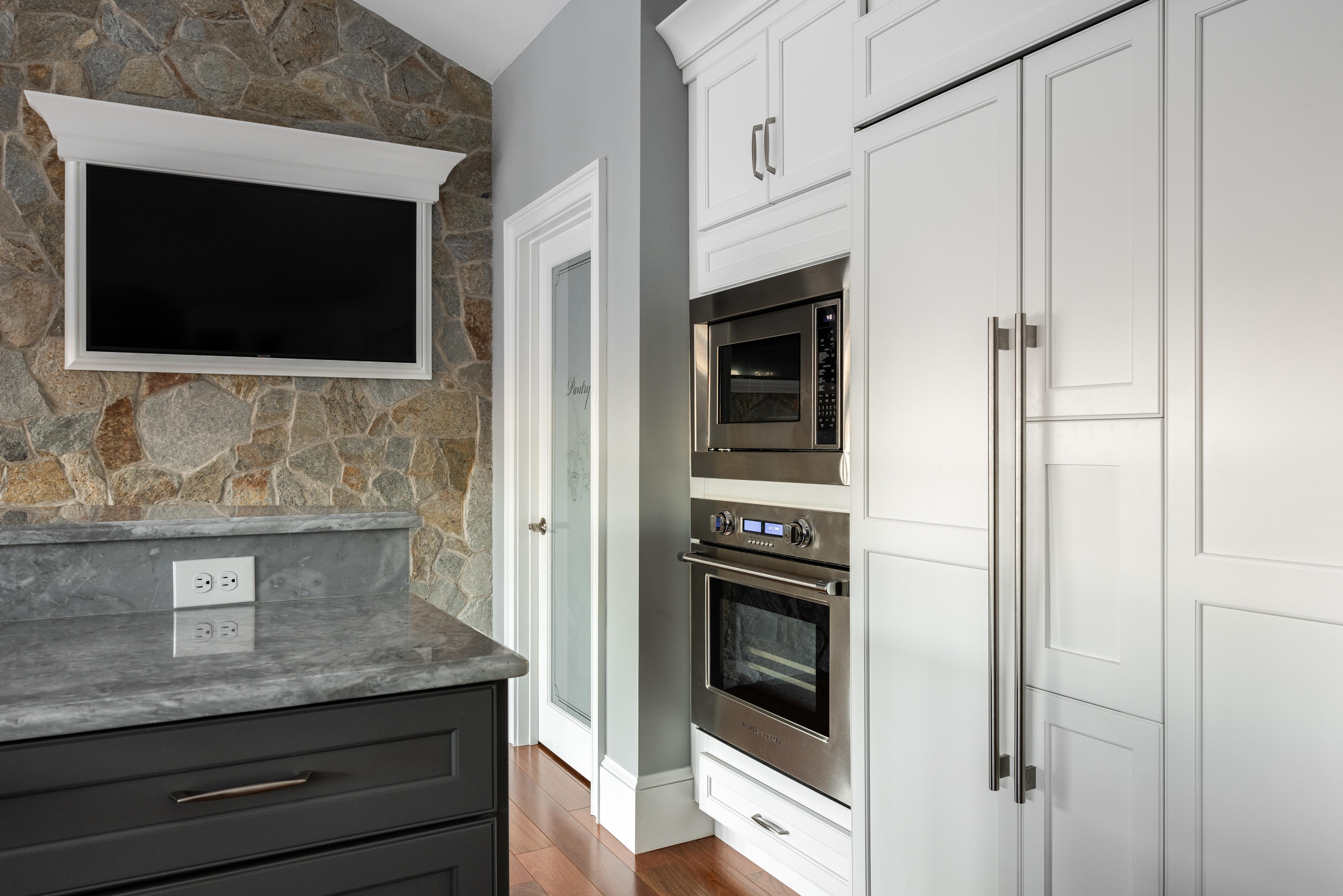 94 Starboard Lane Osterville, MA 02655 - Photo 19 of 47 a kitchen with stainless steel appliances white cabinets and oven
