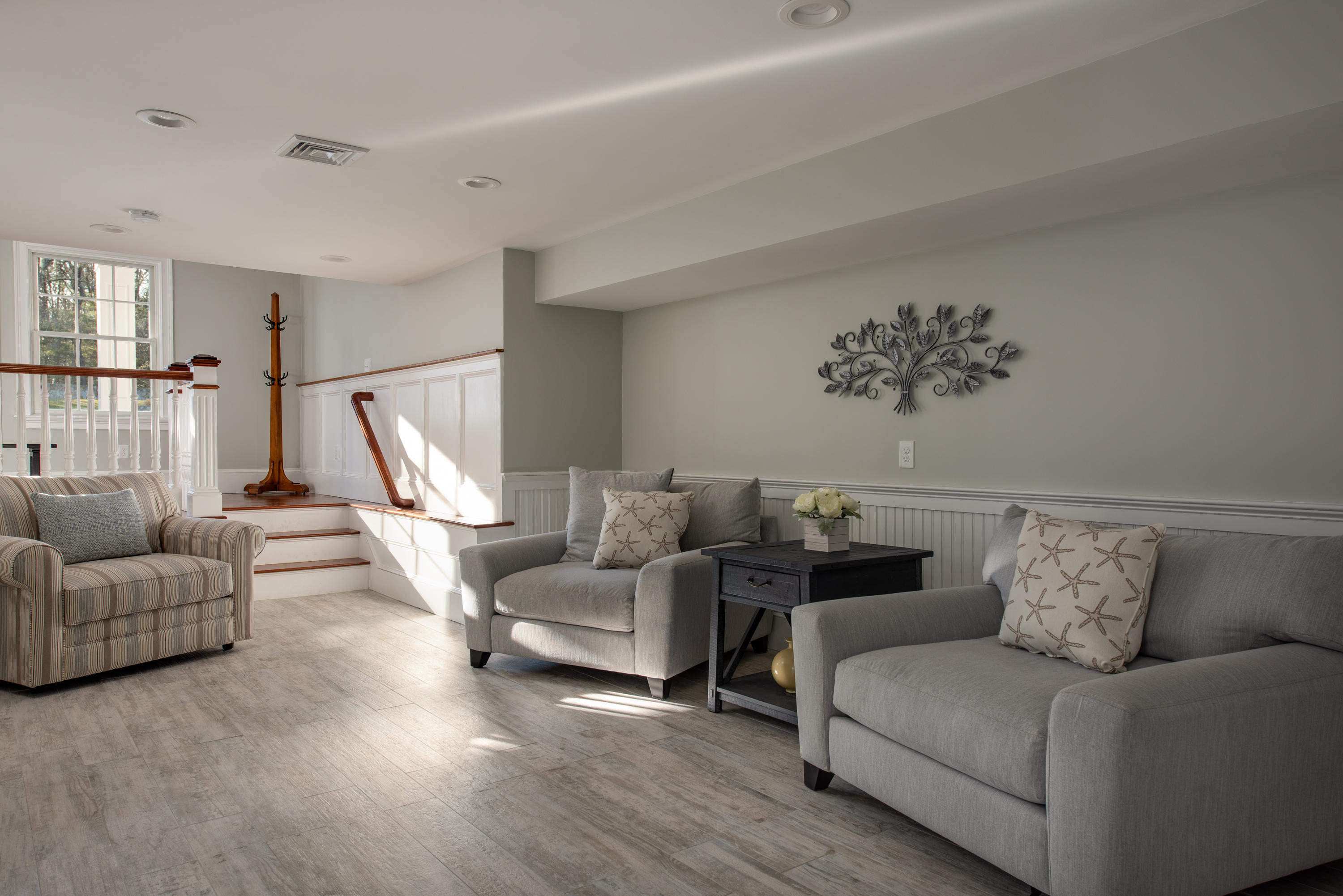 94 Starboard Lane Osterville, MA 02655 - Photo 23 of 47 a living room with furniture and a large window