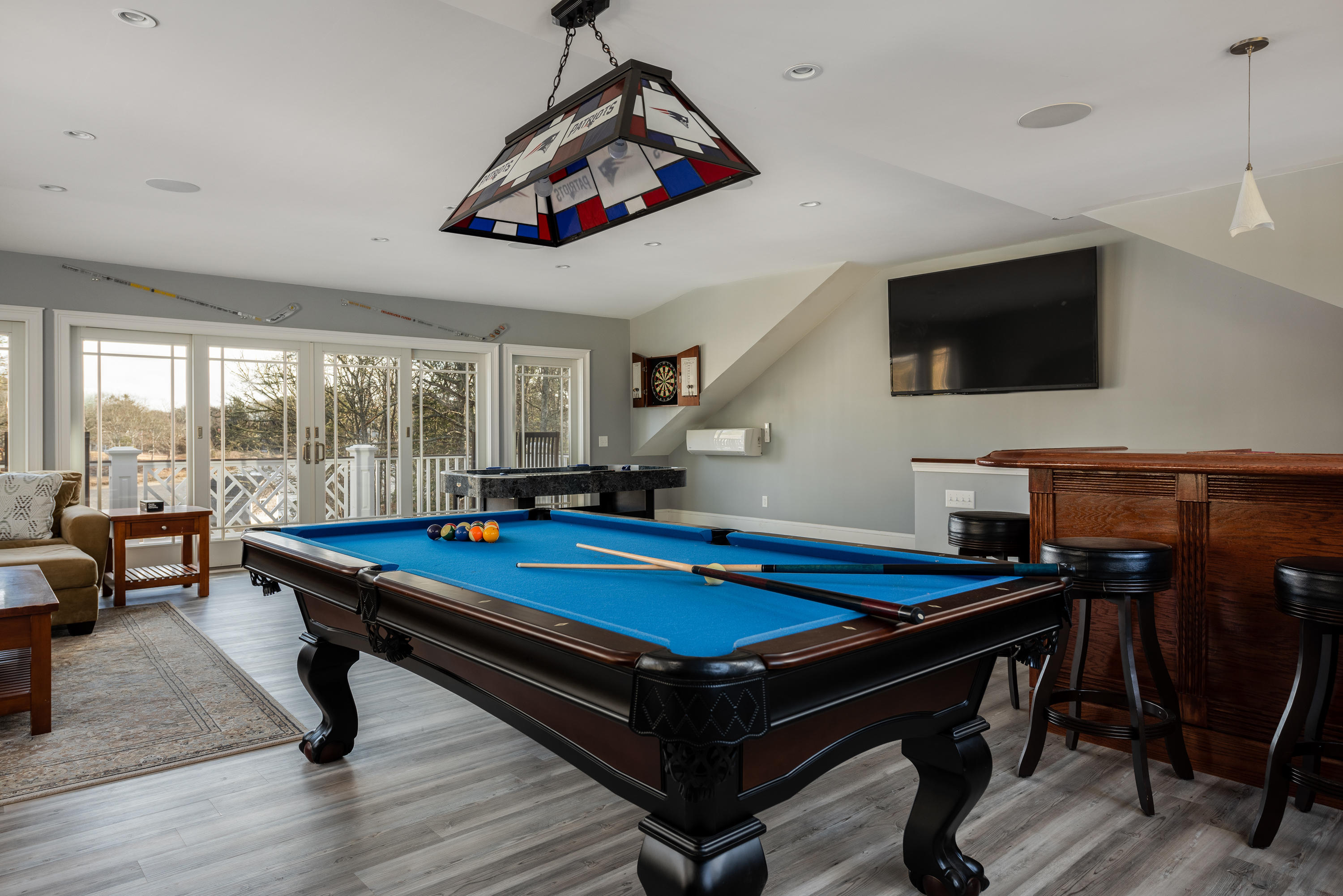 94 Starboard Lane Osterville, MA 02655 - Photo 31 of 47 a room with furniture pool table flat screen tv and windows