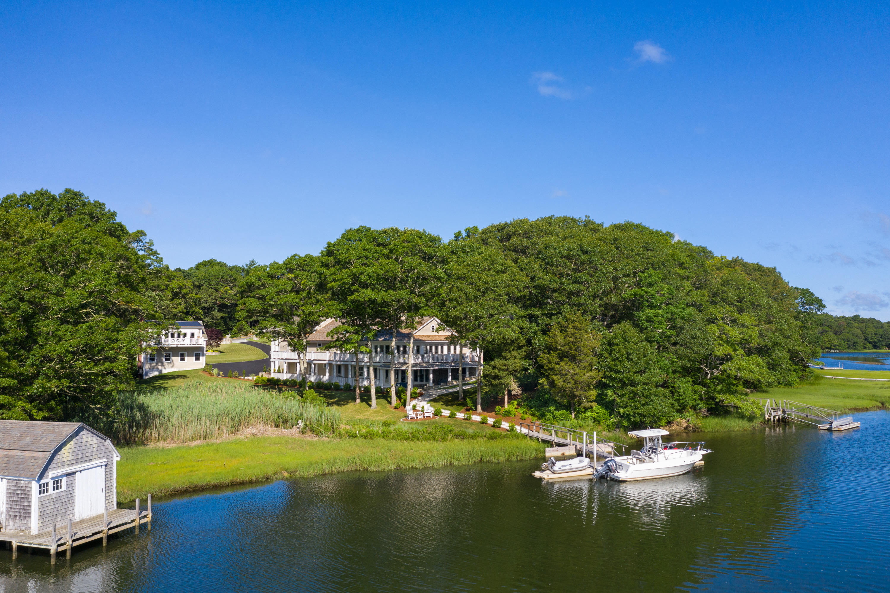 94 Starboard Lane Osterville, MA 02655 - Photo 40 of 47 a view of a lake with houses