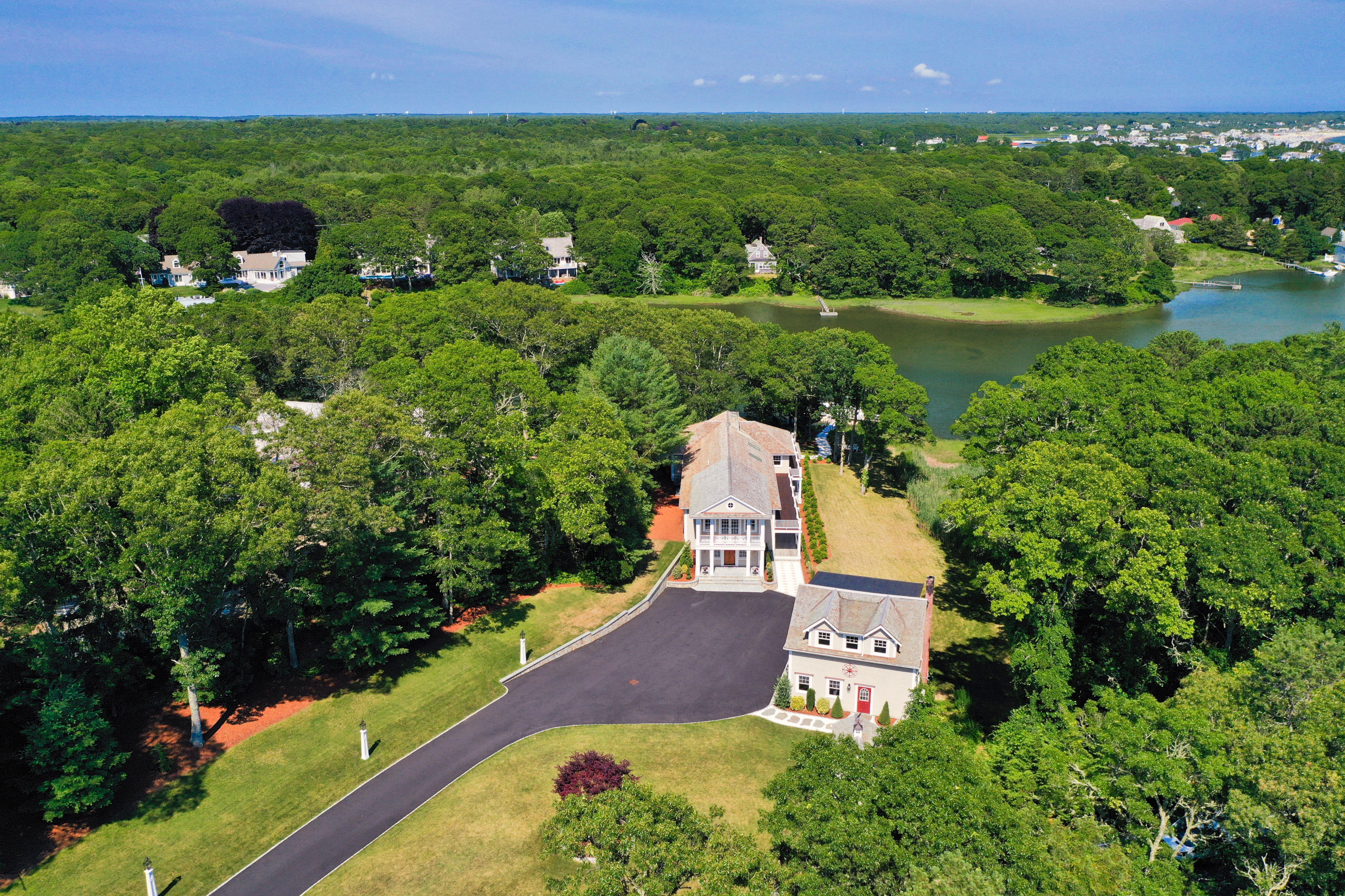 94 Starboard Lane Osterville, MA 02655 - Photo 42 of 47 an aerial view of a house with outdoor space and street view