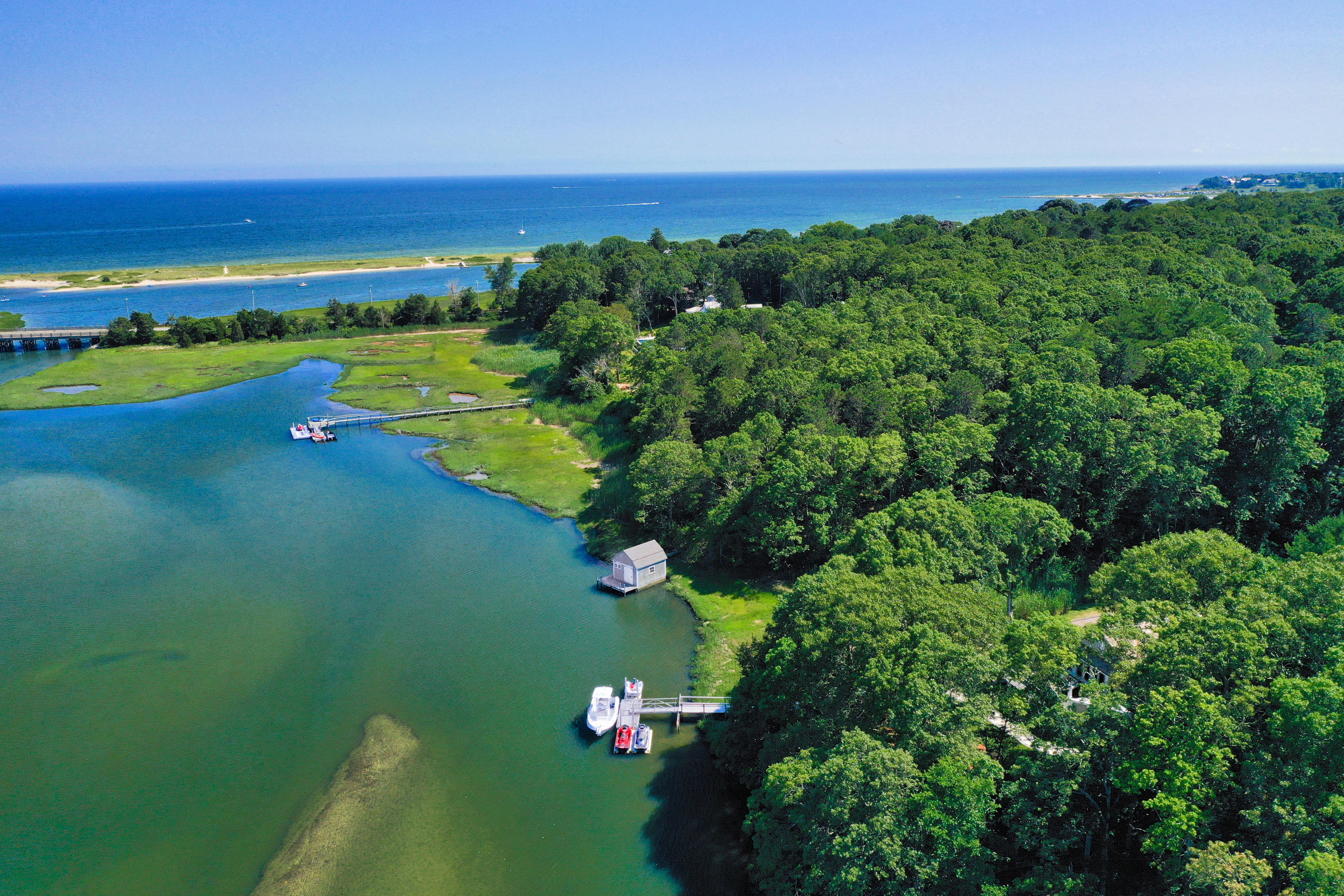 94 Starboard Lane Osterville, MA 02655 - Photo 44 of 47 a view of a garden with an ocean