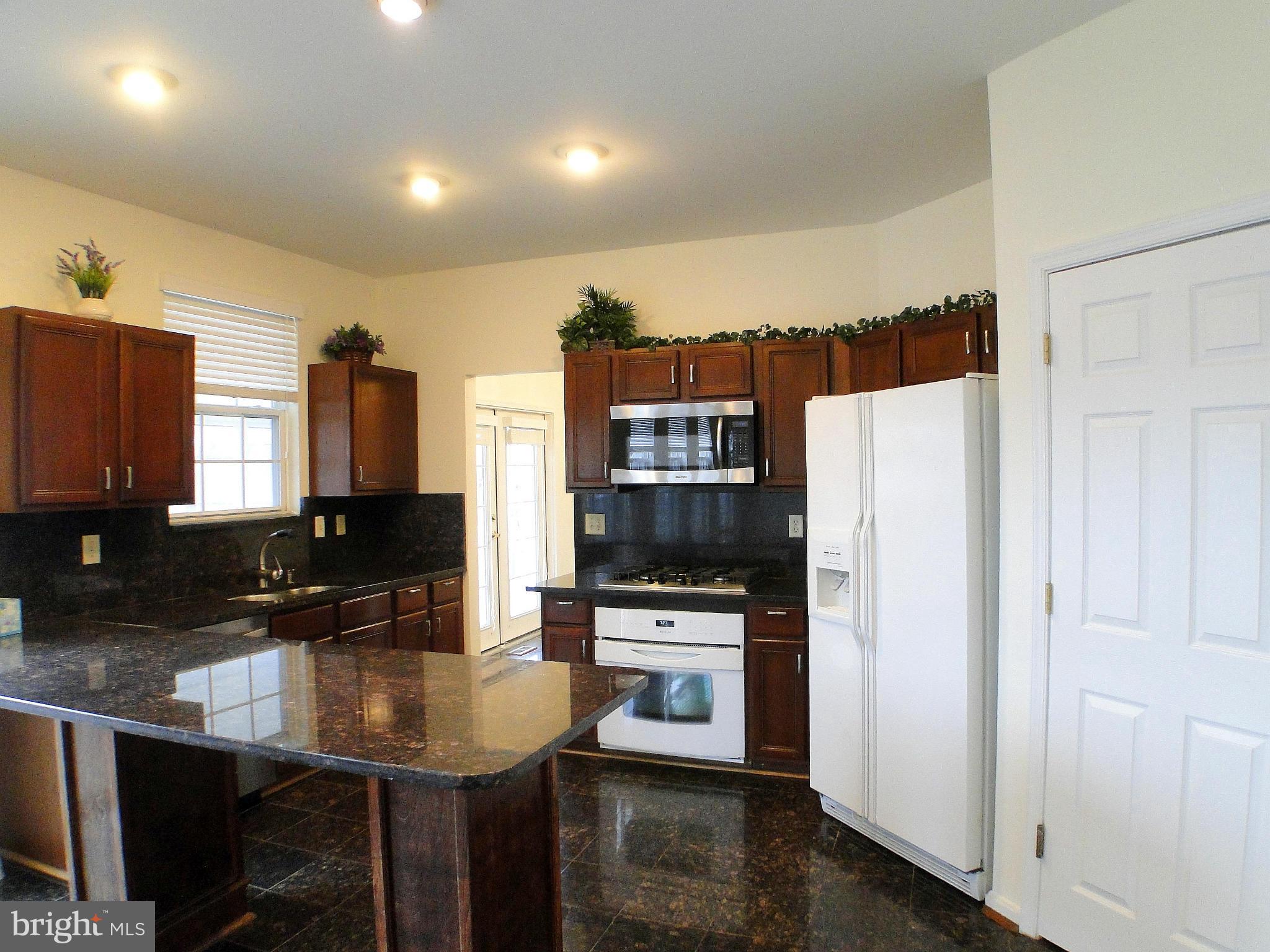 11416 Smiloff Road White Marsh, MD 21162 - Photo 12 of 30 Kitchen w/ Breakfast Bar Seating
